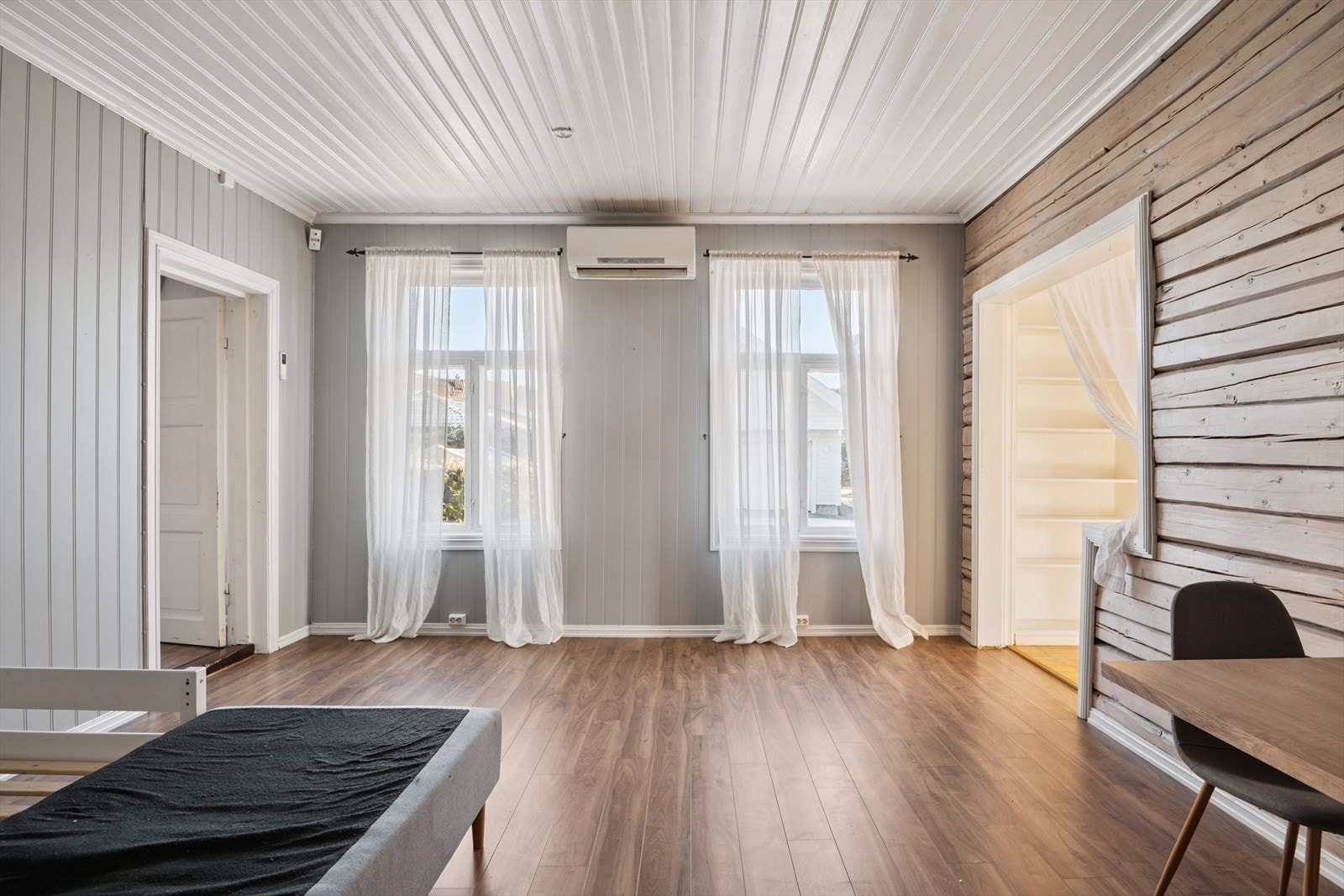 Mellom stuen og kjøkkenet ligge der en stue gir ekstra fleksibilitet for familien. Galleribilde