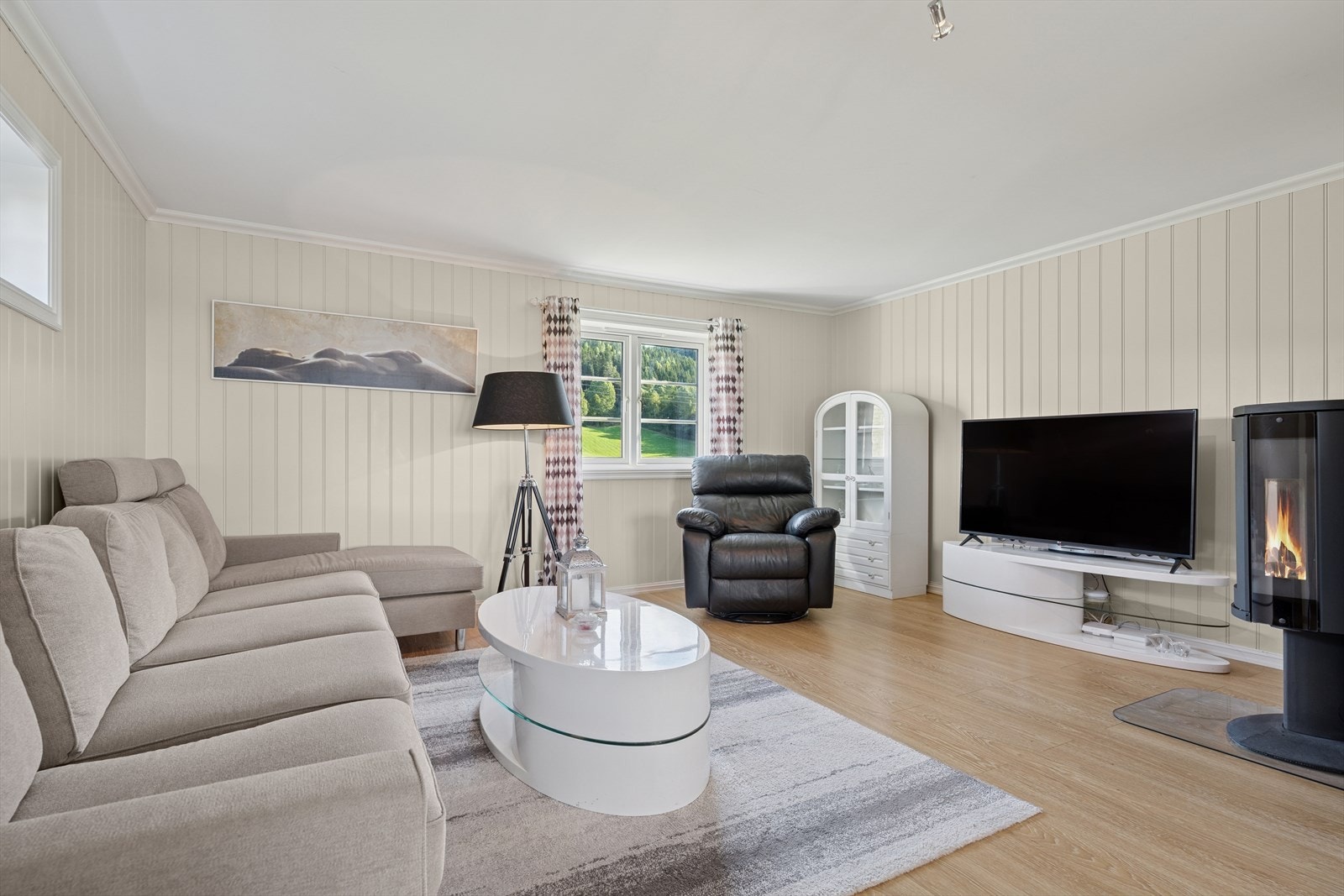 Vedovnen gir både varme og stemning i stuen. Galleribilde