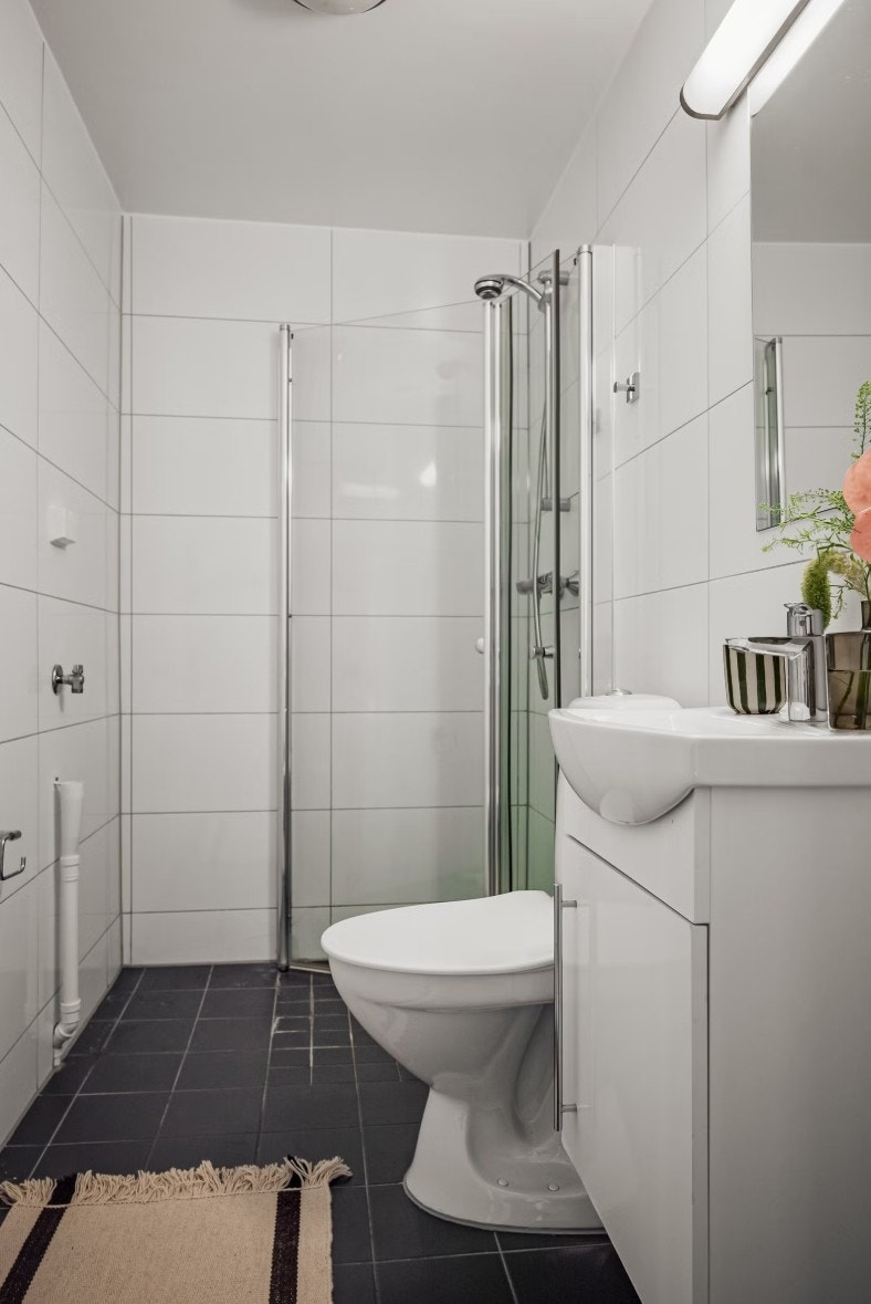 Flislagt bad med varme i gulv Galleribilde