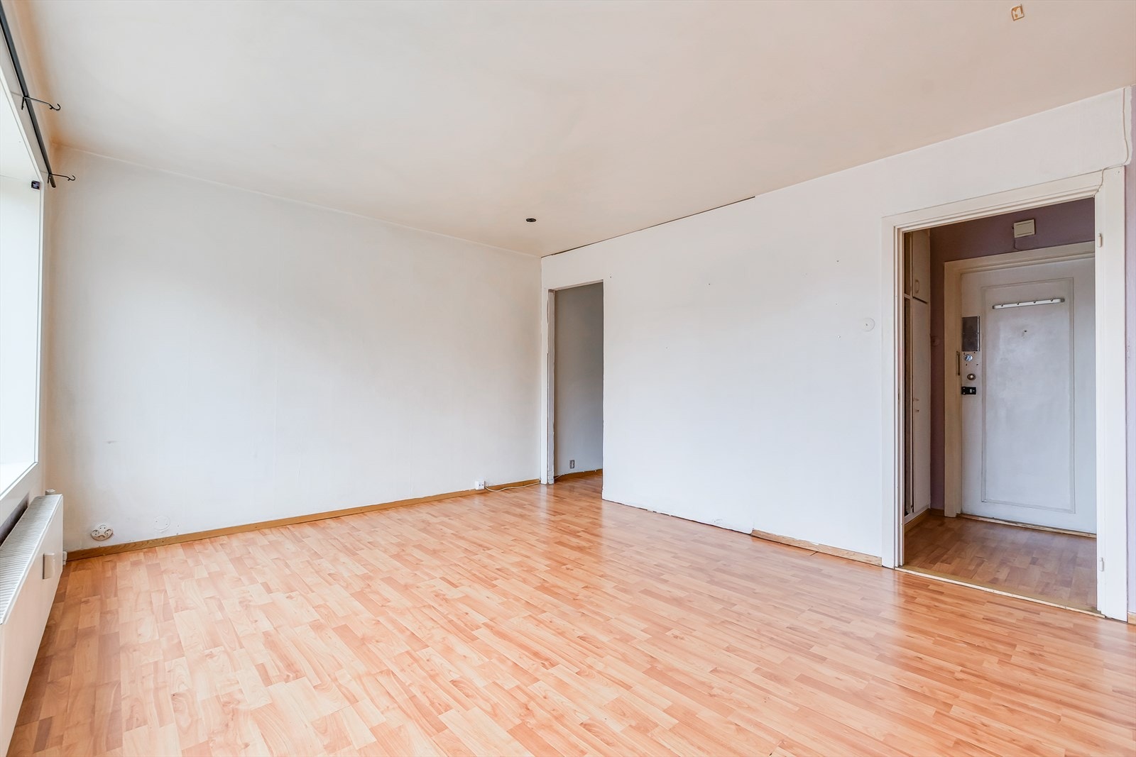 Planløsningen gir mulighet for å gjøre boligen om til 2-roms ved å flytte kjøkkenet ut i stuen. Galleribilde