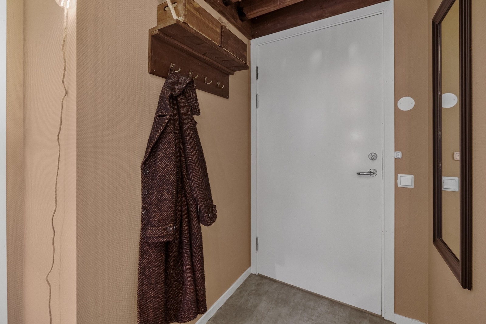 Vel inne blir du møtt av en entré som gir et godt førsteinntrykk av leiligheten. Galleribilde