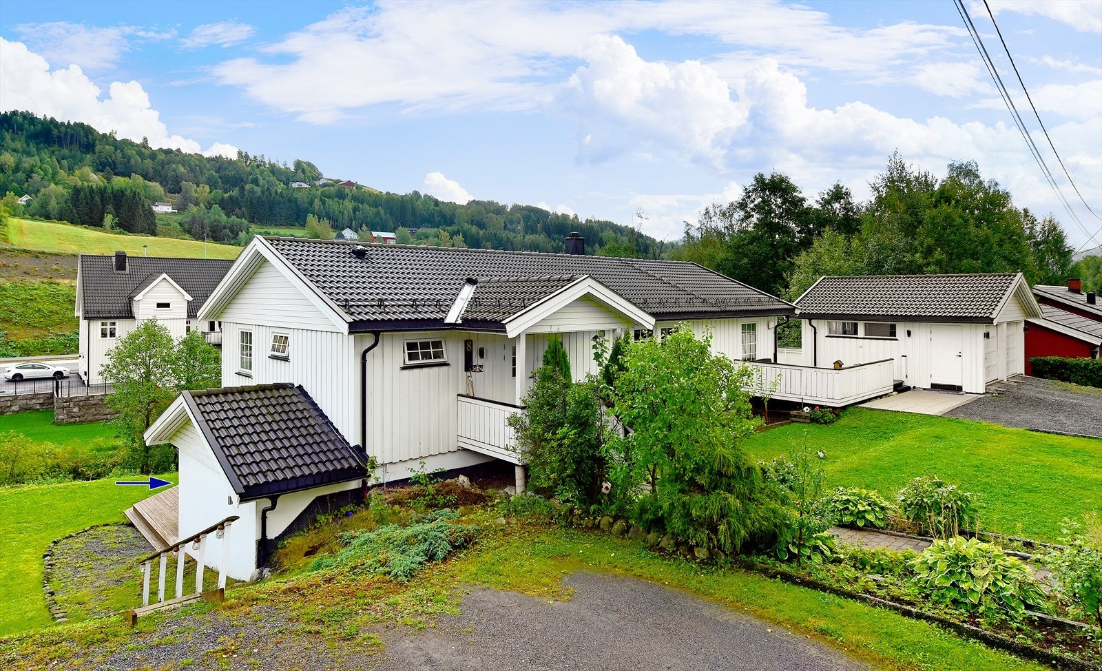 Leiligheten ligger i en tremanns bolig Galleribilde