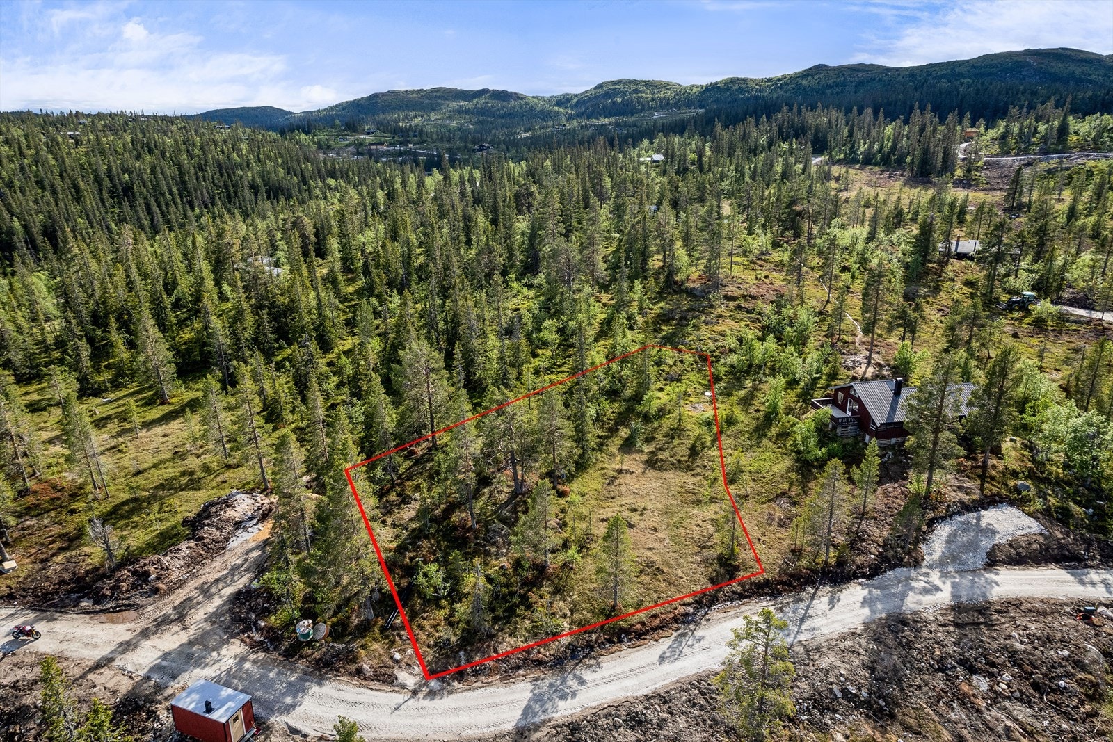 Eiendomsmegler MNEF Lars Bredeveien åresenterer en fin og romslig tomt på nesten 1,4 mål i Votnedalen på Vegglifjell..jpg Galleribilde