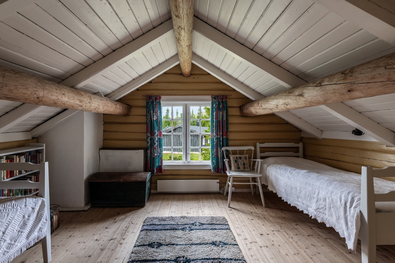 Fra kjøkkenet er det trapp opp til oppstugu. Galleribilde