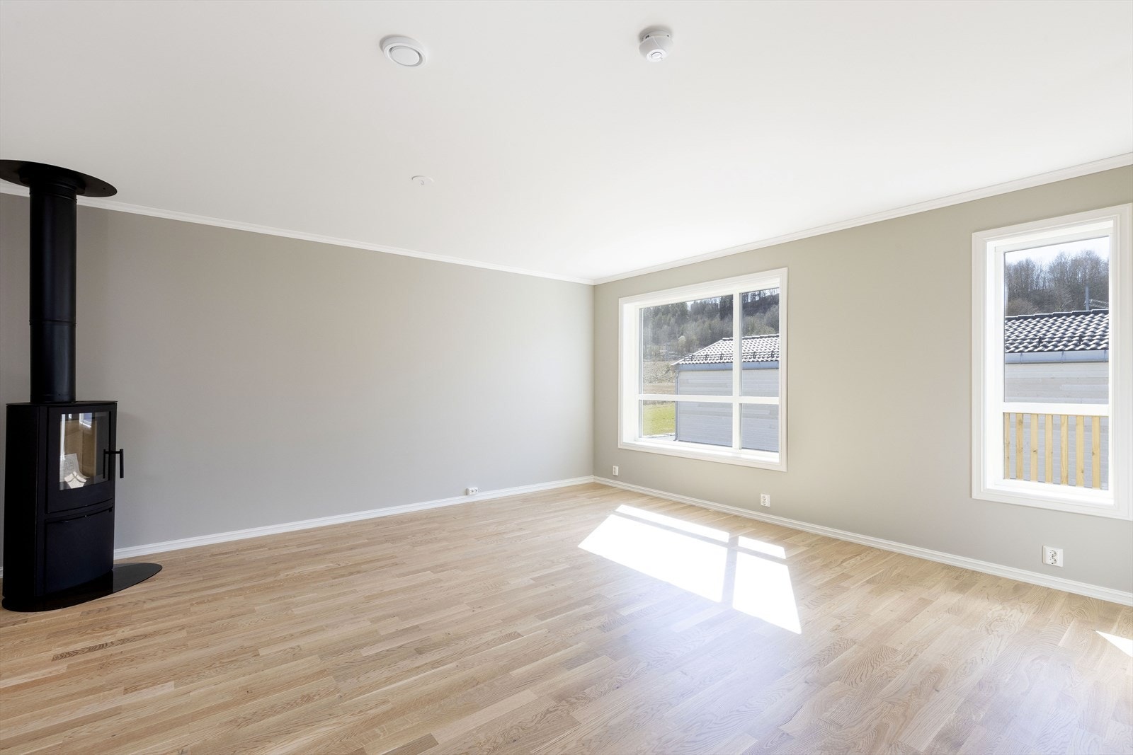 Leiligheten er malt i lune og duse farger Galleribilde