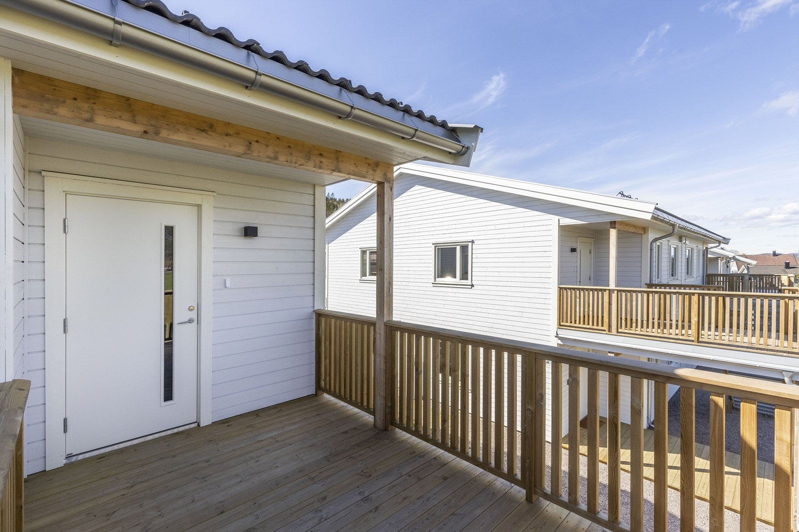 Hyggelig overbygget inngangsparti Galleribilde