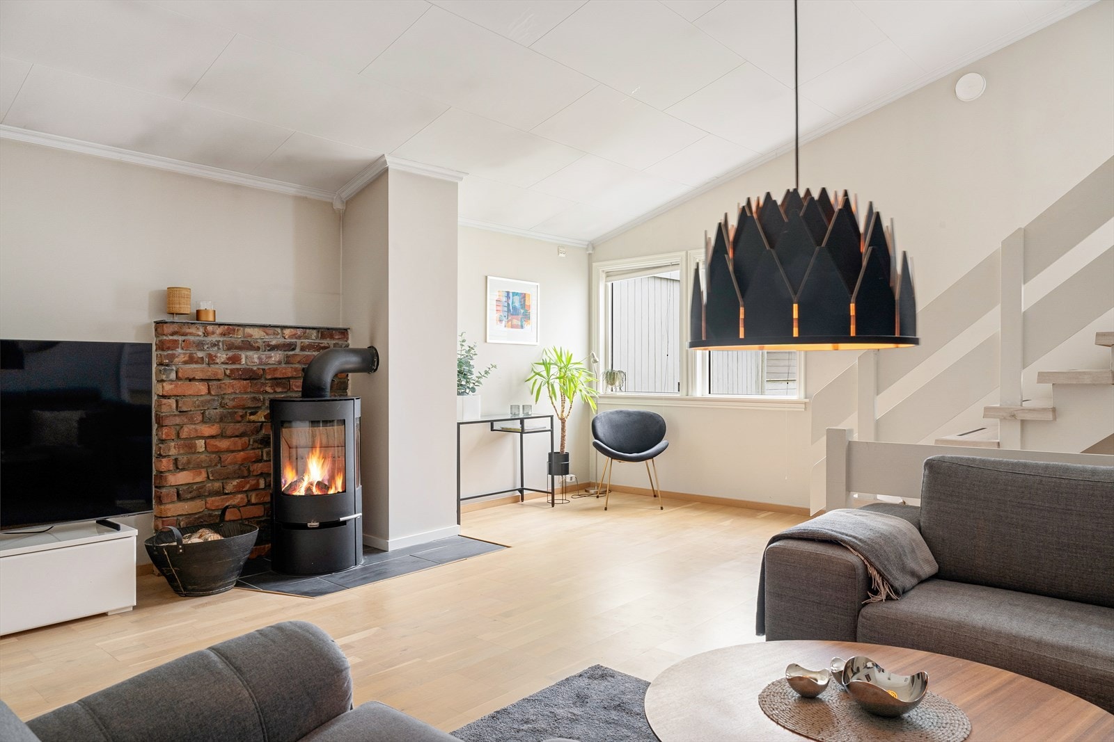 Peisen skaper et varmt, lunt og innbydende inneklima. Galleribilde