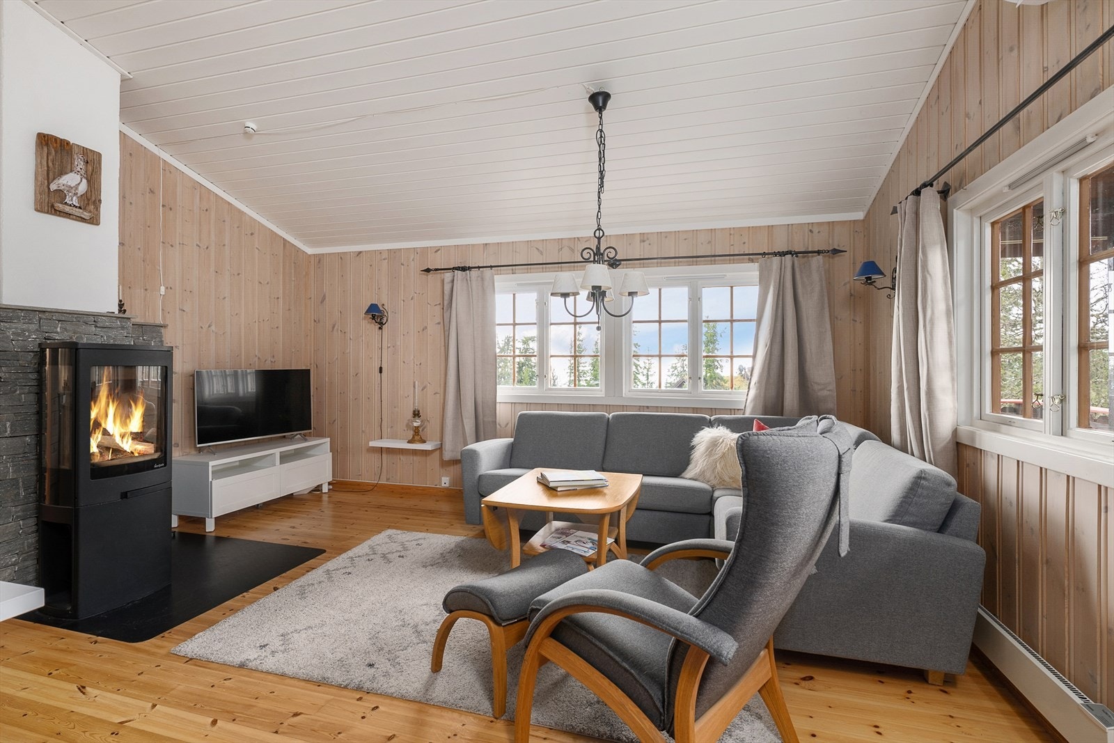 Fyr i ovnen skaper den ekstra gode stemningen. Galleribilde