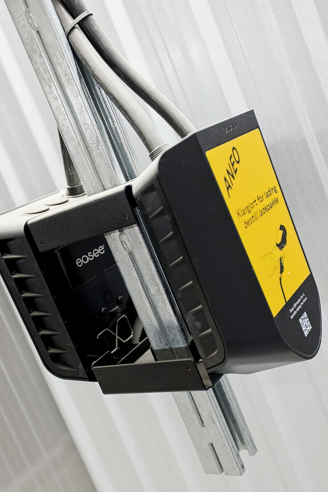 Parkeringsplassen i garasjekjelleren er klargjort for å installere elbillader. Galleribilde