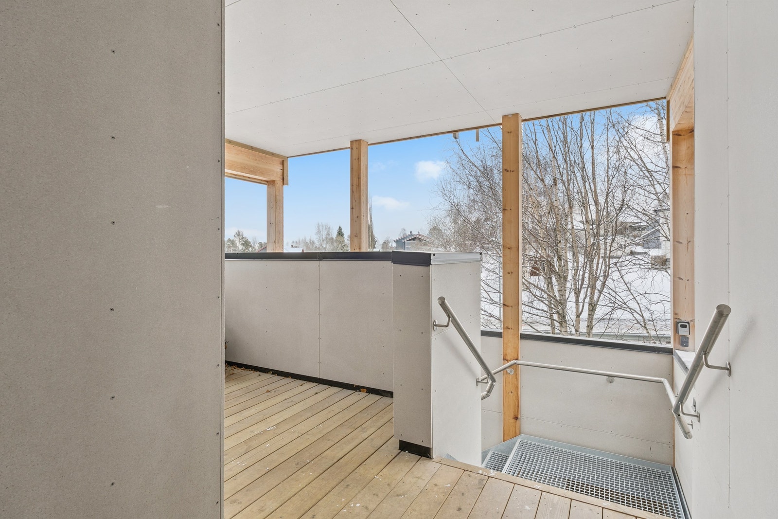 Trapperommet som leder opp til leilighetens inngangsparti. Galleribilde