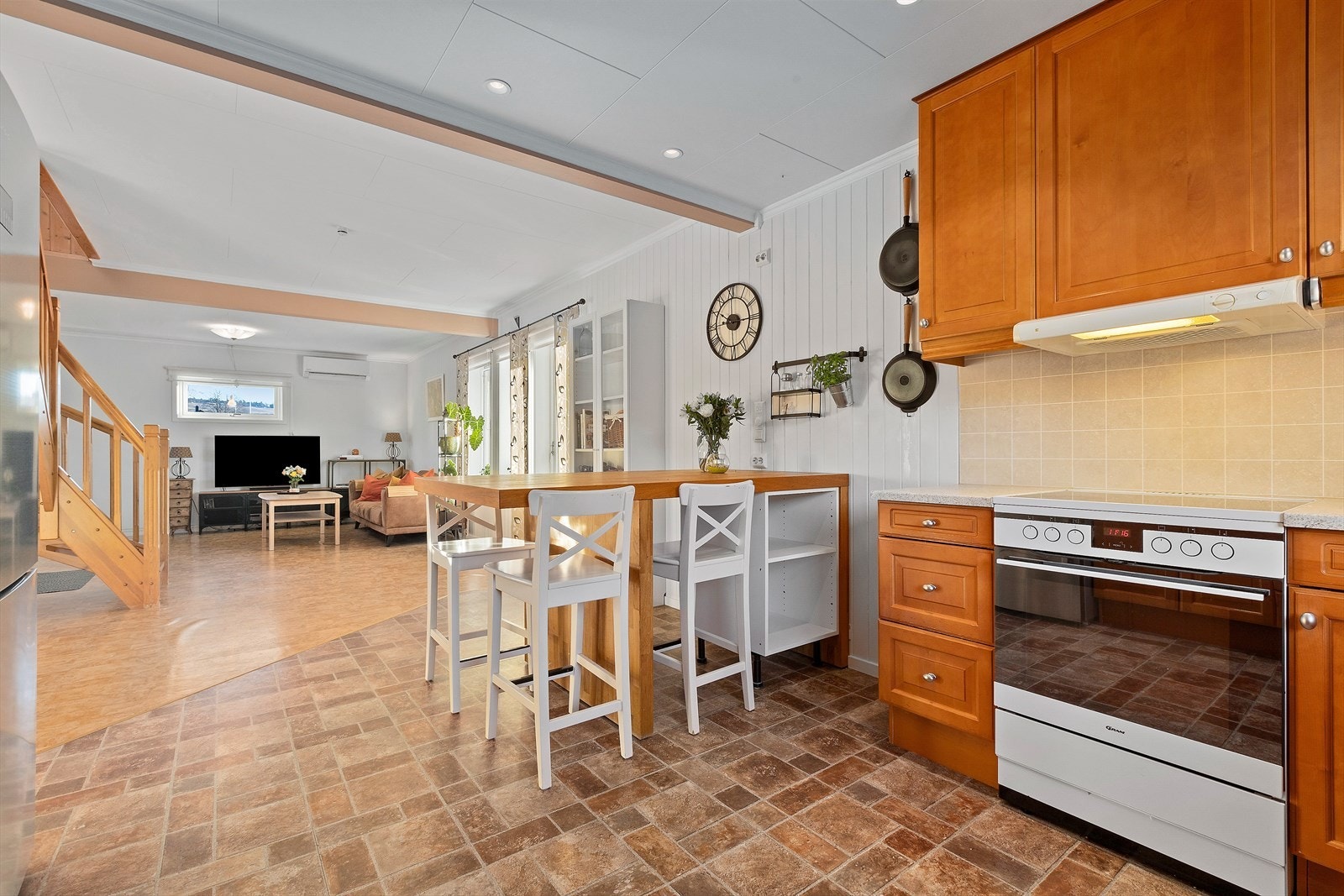 På enden er det en koselig sitteplass på en praktisk barløsning. Galleribilde