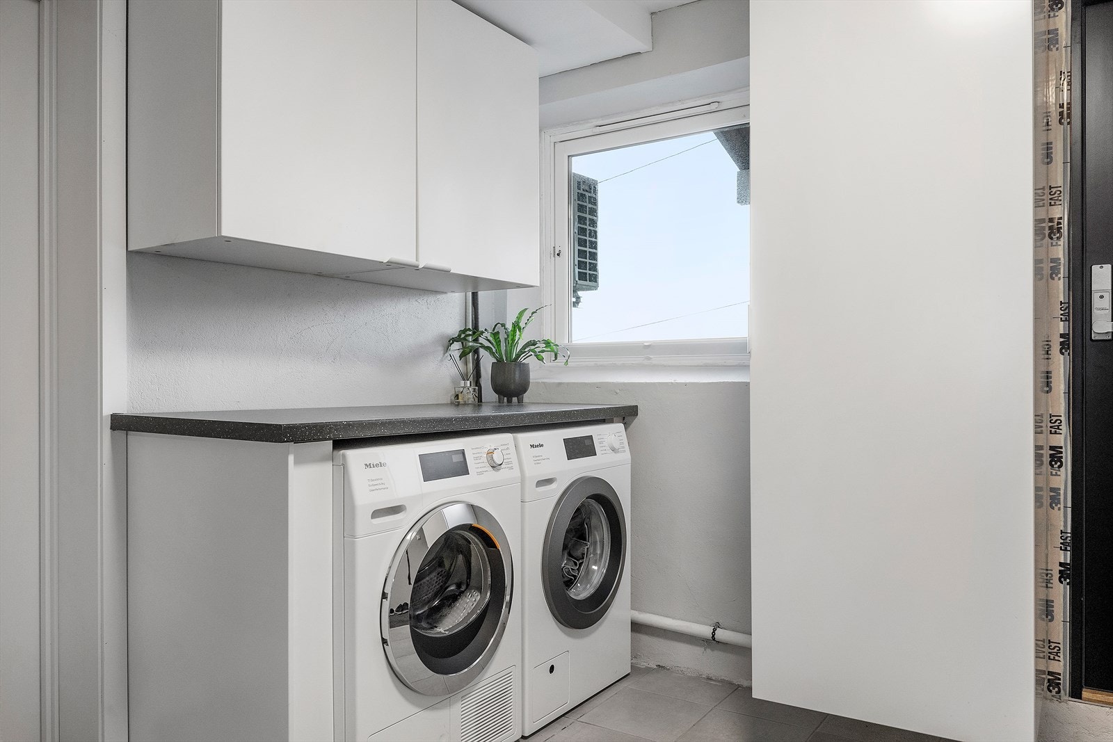 Plass til vaskemaskin og tørketrommel Galleribilde