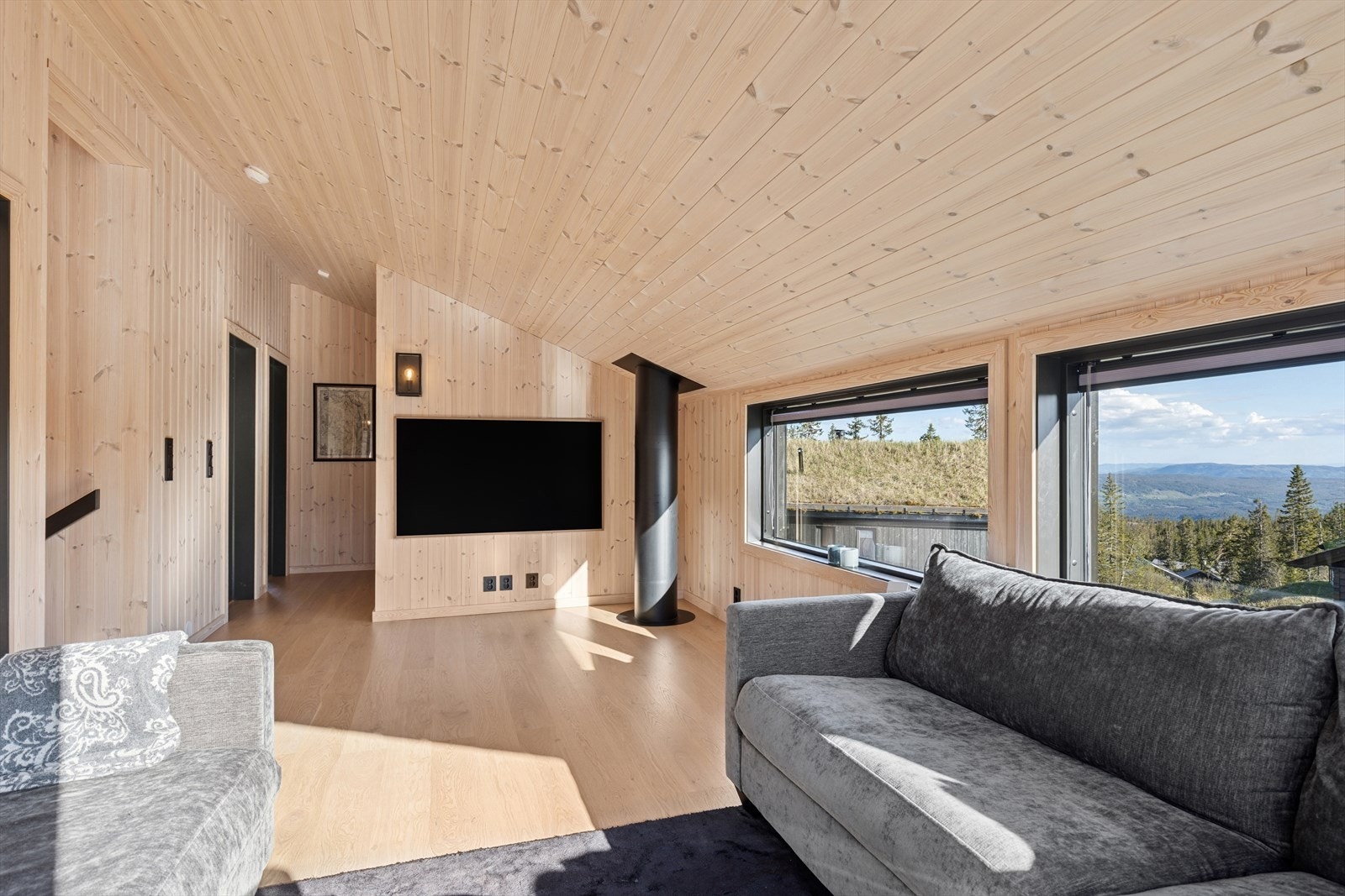 Stuen passer også fint dersom du skulle trenge noen ekstra sengeplasser. Galleribilde