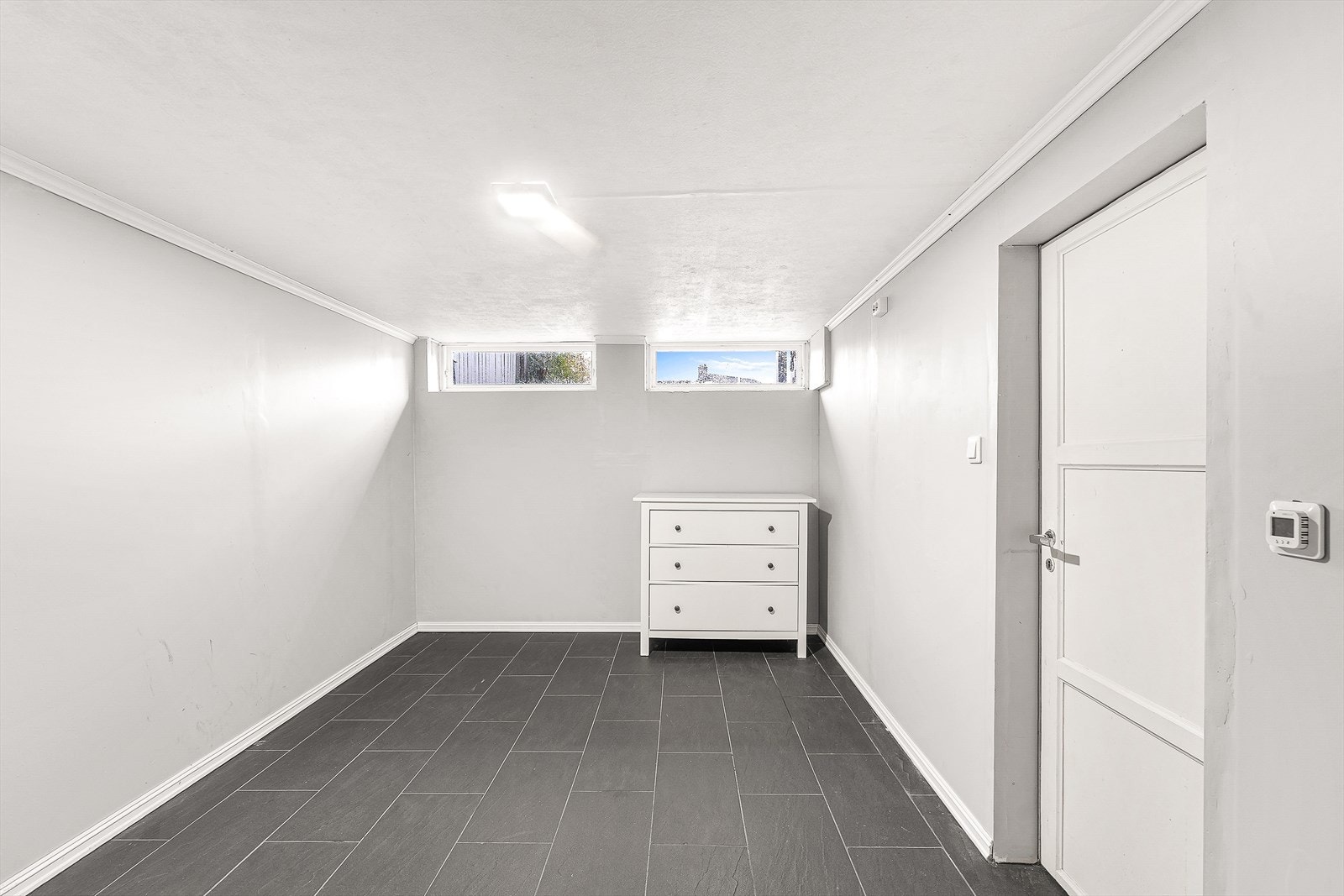 Innredet hobbyrom m/flislagt gulv Galleribilde