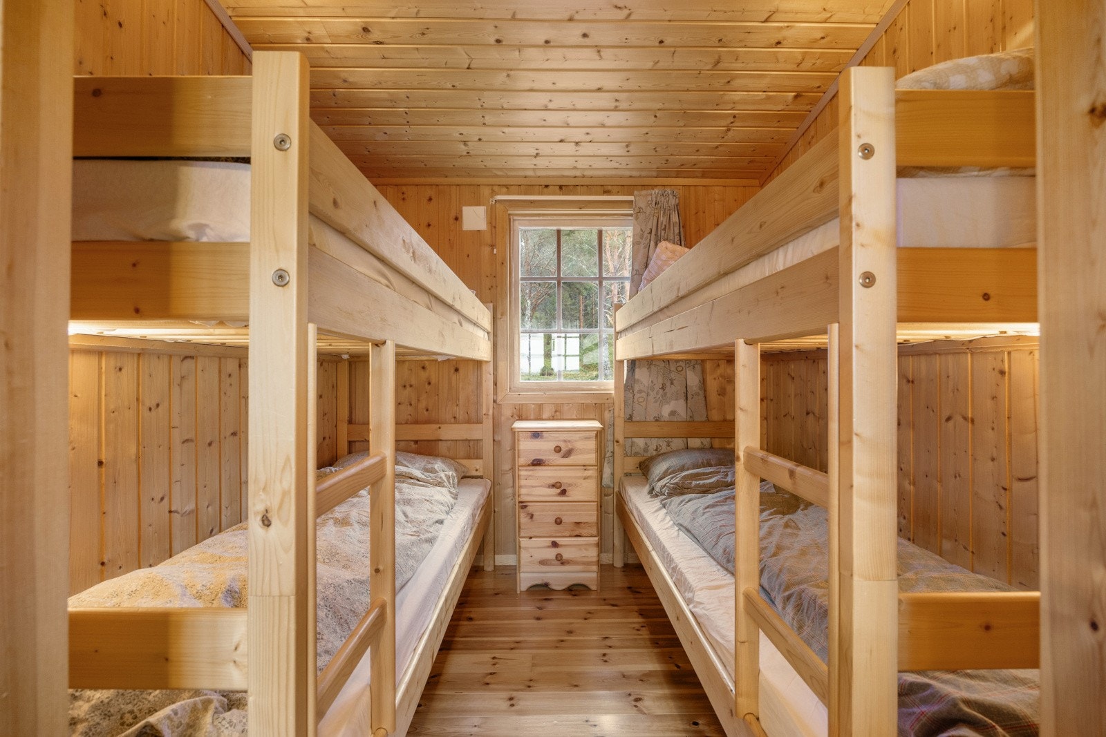 Soverom III har har to sett med køyesenger, ideelt for gjester eller familieovernatting. Galleribilde