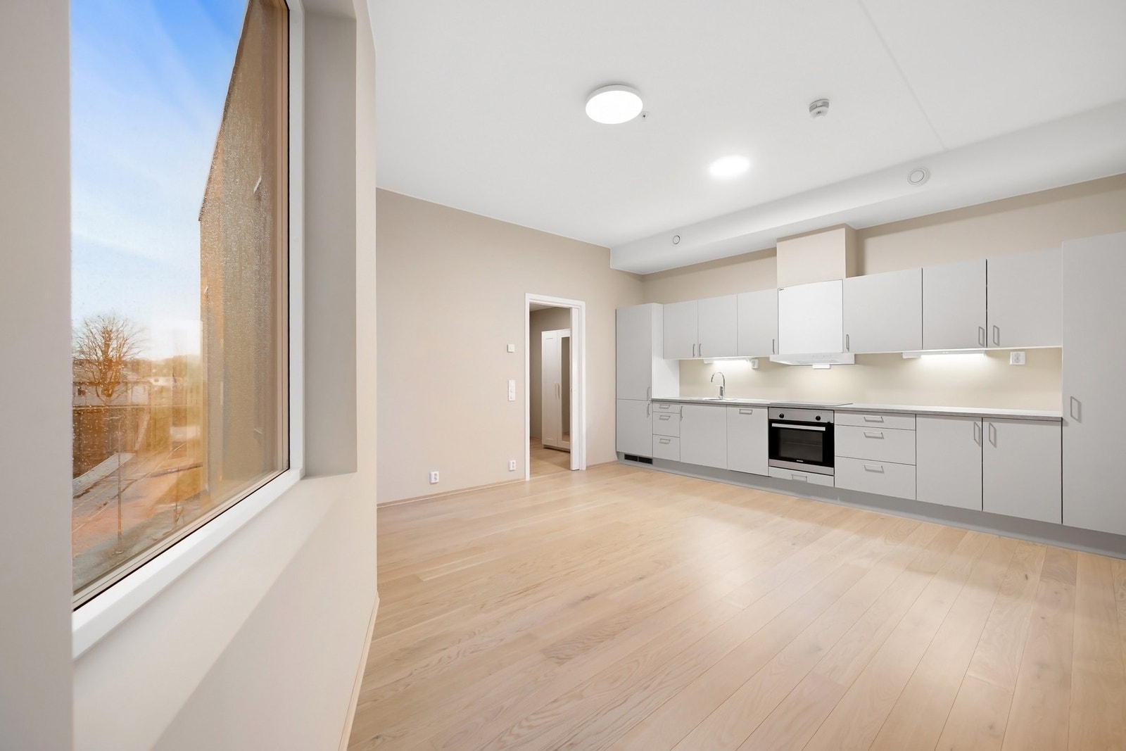 Leiligheten har en praktisk åpen stue/kjøkken løsning. Galleribilde