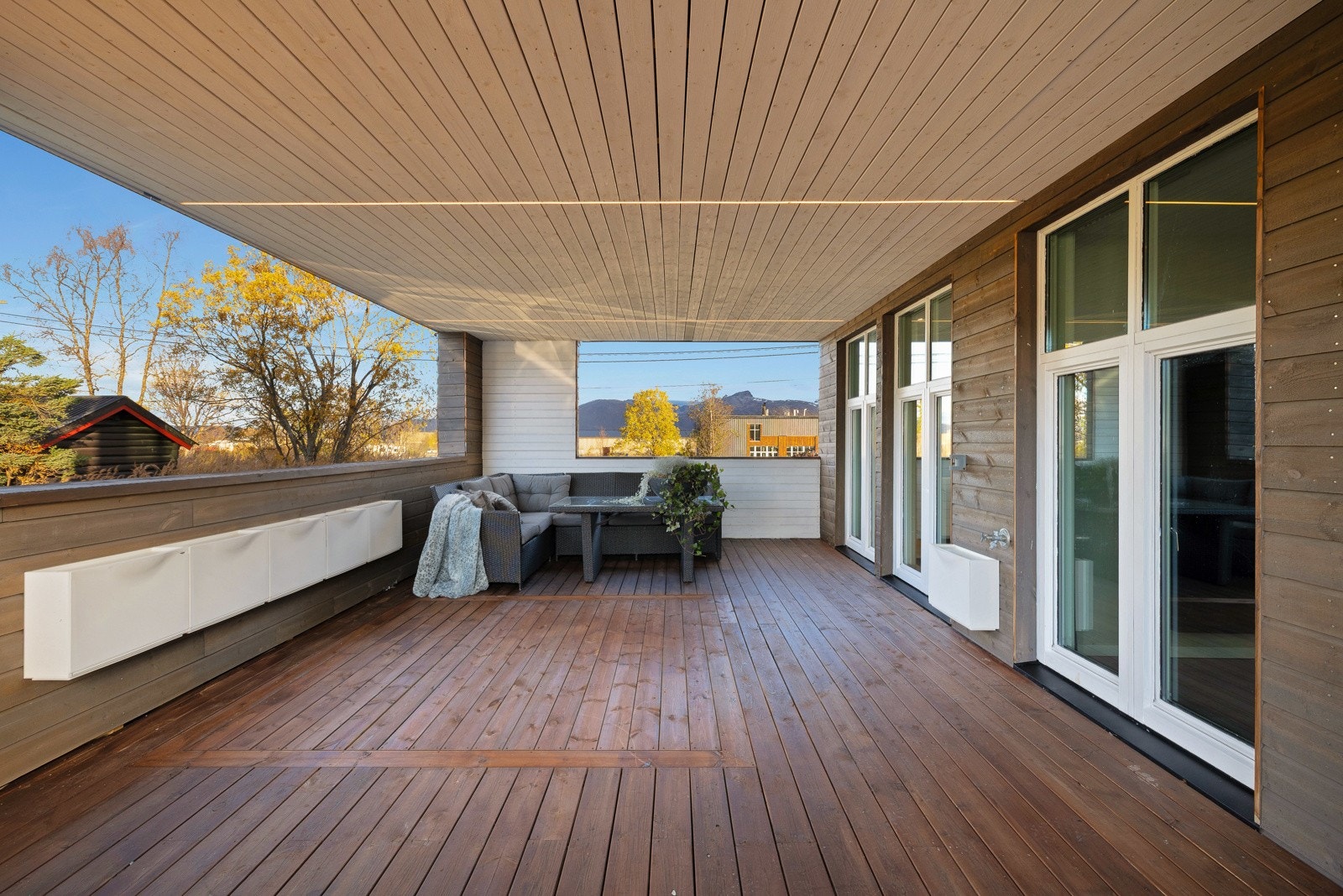 Her sitter du skjermet for vær og vind Galleribilde