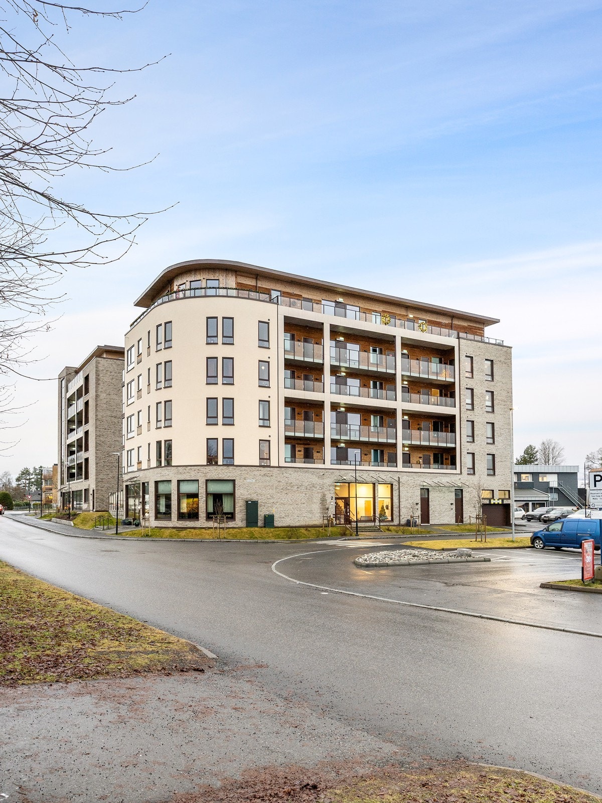 Fasade. Leiligheten er sentralt plassert i nye Aurkvartalet på Aursmoen. Galleribilde