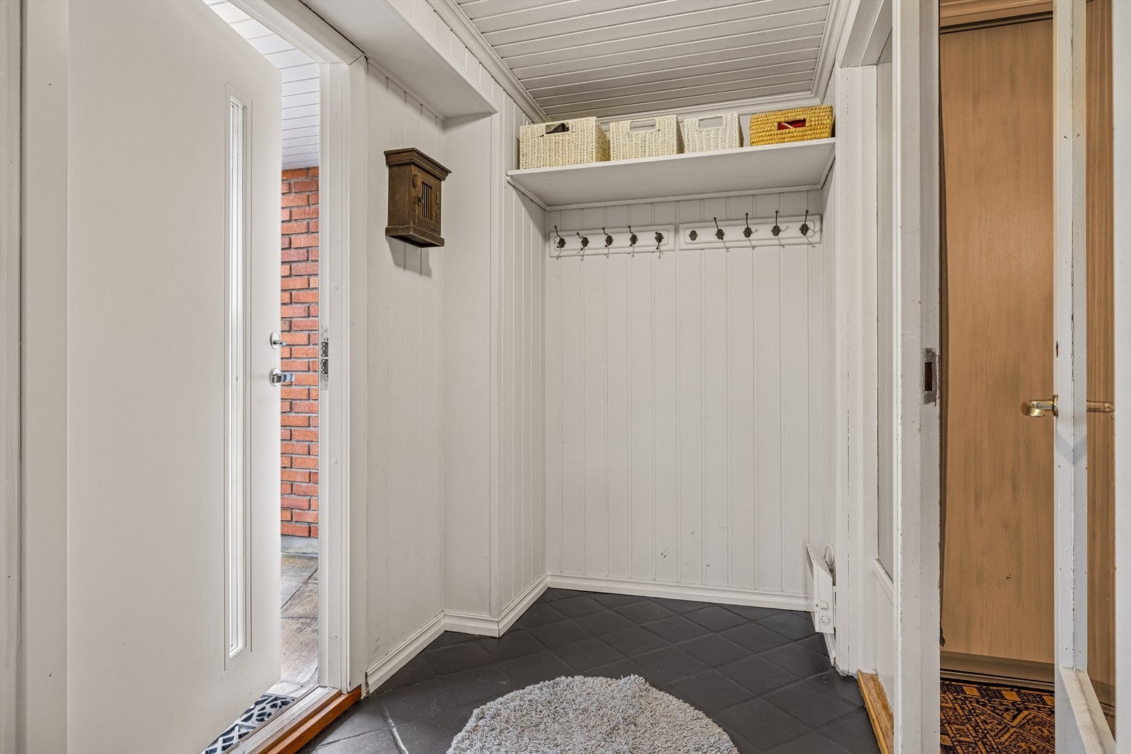 Vindfang med garderobeplass Galleribilde