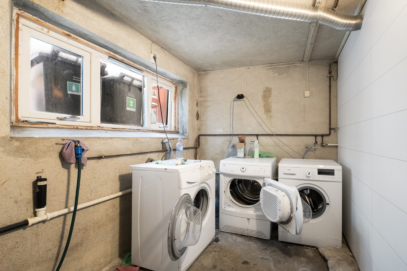 Sameiet har felles vaskerom hvor man kan koble til sin egen vaskemaskin. Galleribilde