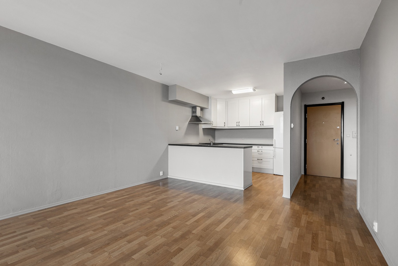 Åpen kjøkkenløsning bidrar til en sosial atmosfære Galleribilde