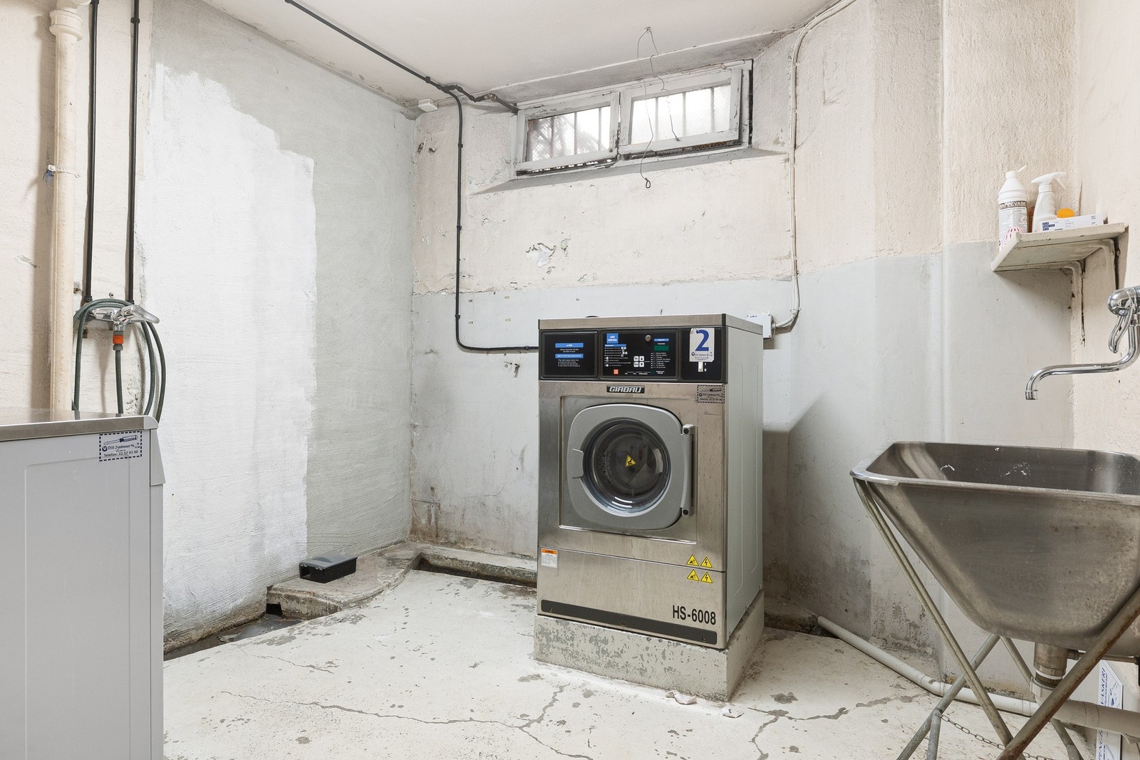 Det finnes fellesvaskeri i bygget. Galleribilde
