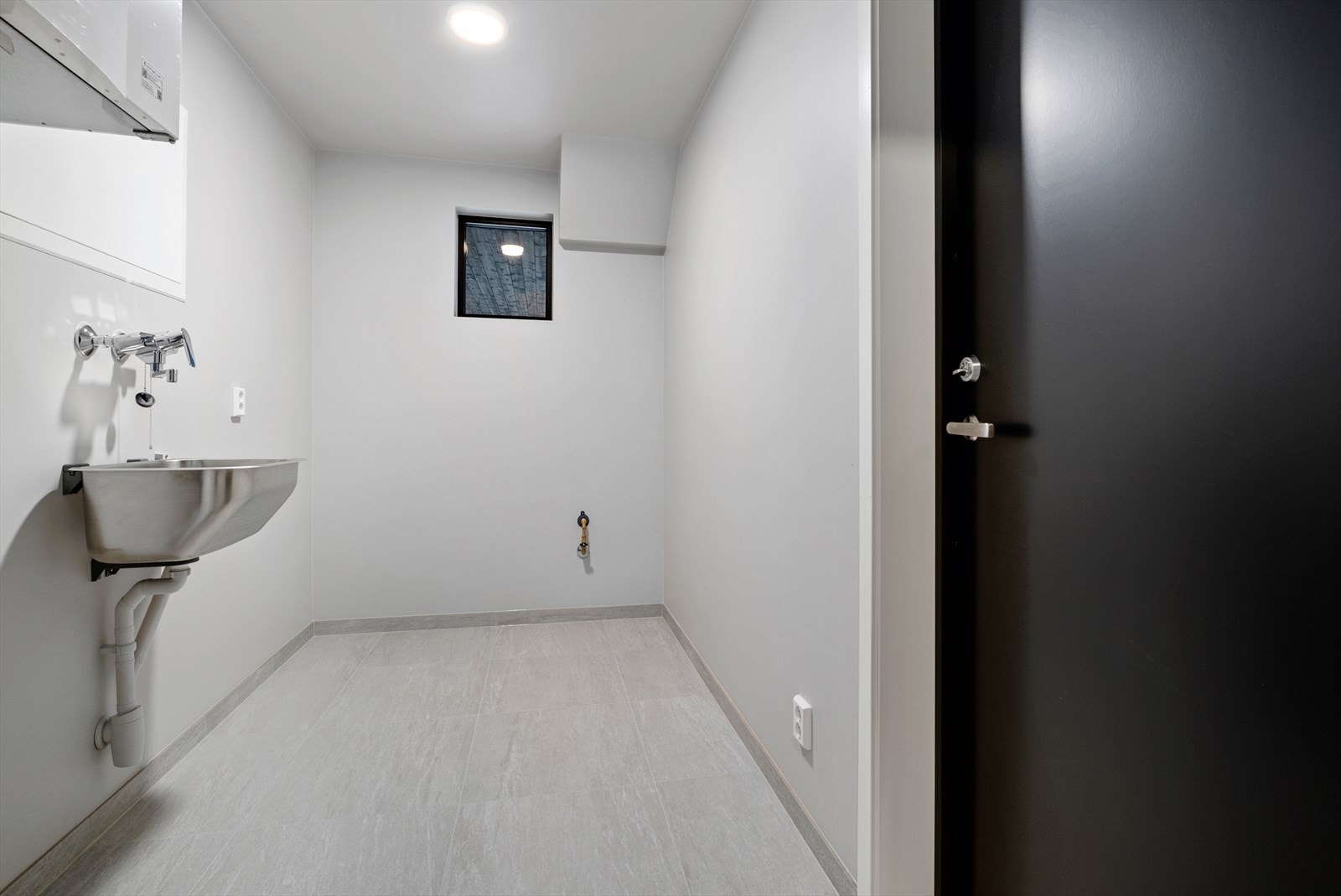 I entreen får du et praktisk vaskerom like innenfor inngangsdøren. Galleribilde