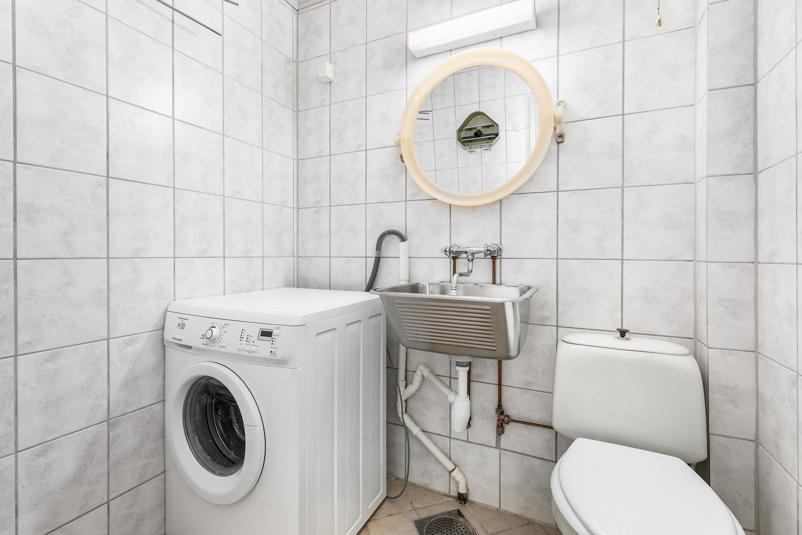 Vaskerommet er fra byggeåret, men ble i 2008 oppgradert med nye overflater på gulv og vegger. Også dette er gitt TG 2 i helhet. Galleribilde