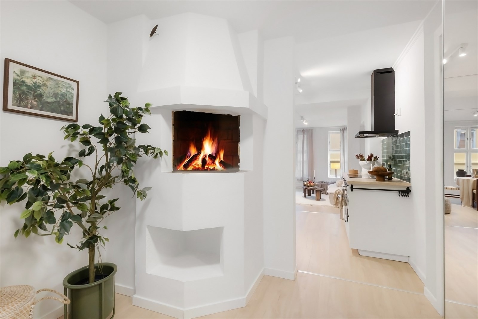 Det er to vedovner i boligen. Galleribilde