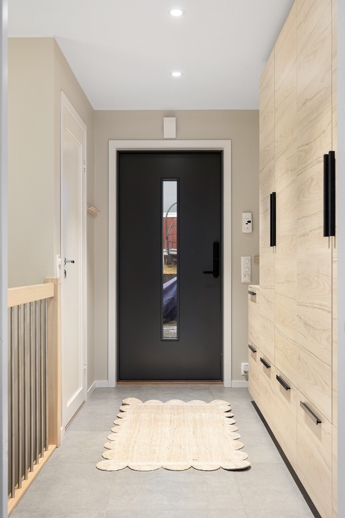 Det er varmekabler i gangen både i første etasje og i underetasjen. Galleribilde