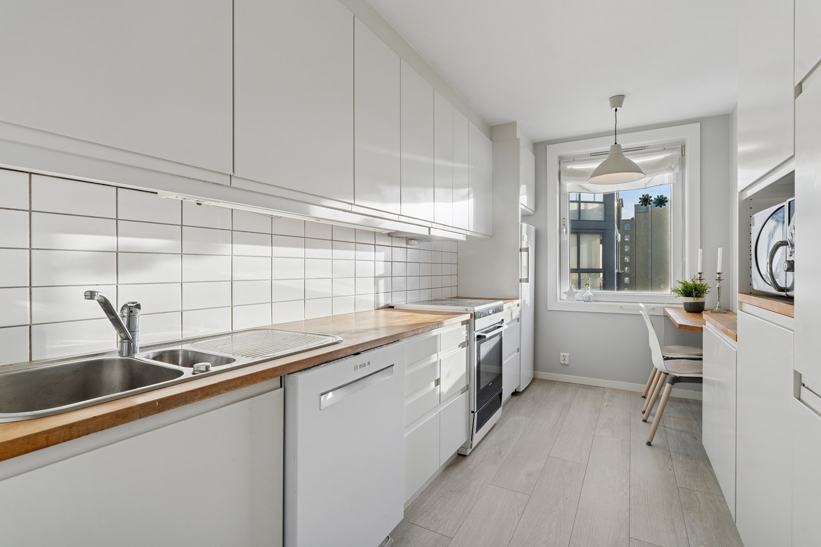 En liten lesekrok eller frokost hjørnet på kjøkkenet. Galleribilde