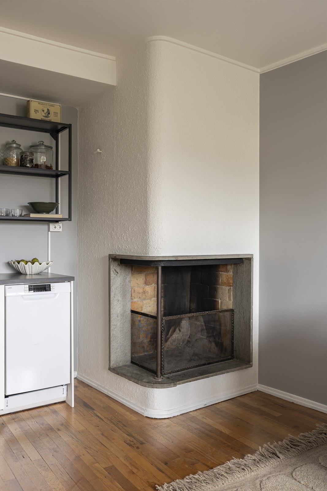 Peis i stuen som skaper en lun og koselig atmosfære. Galleribilde