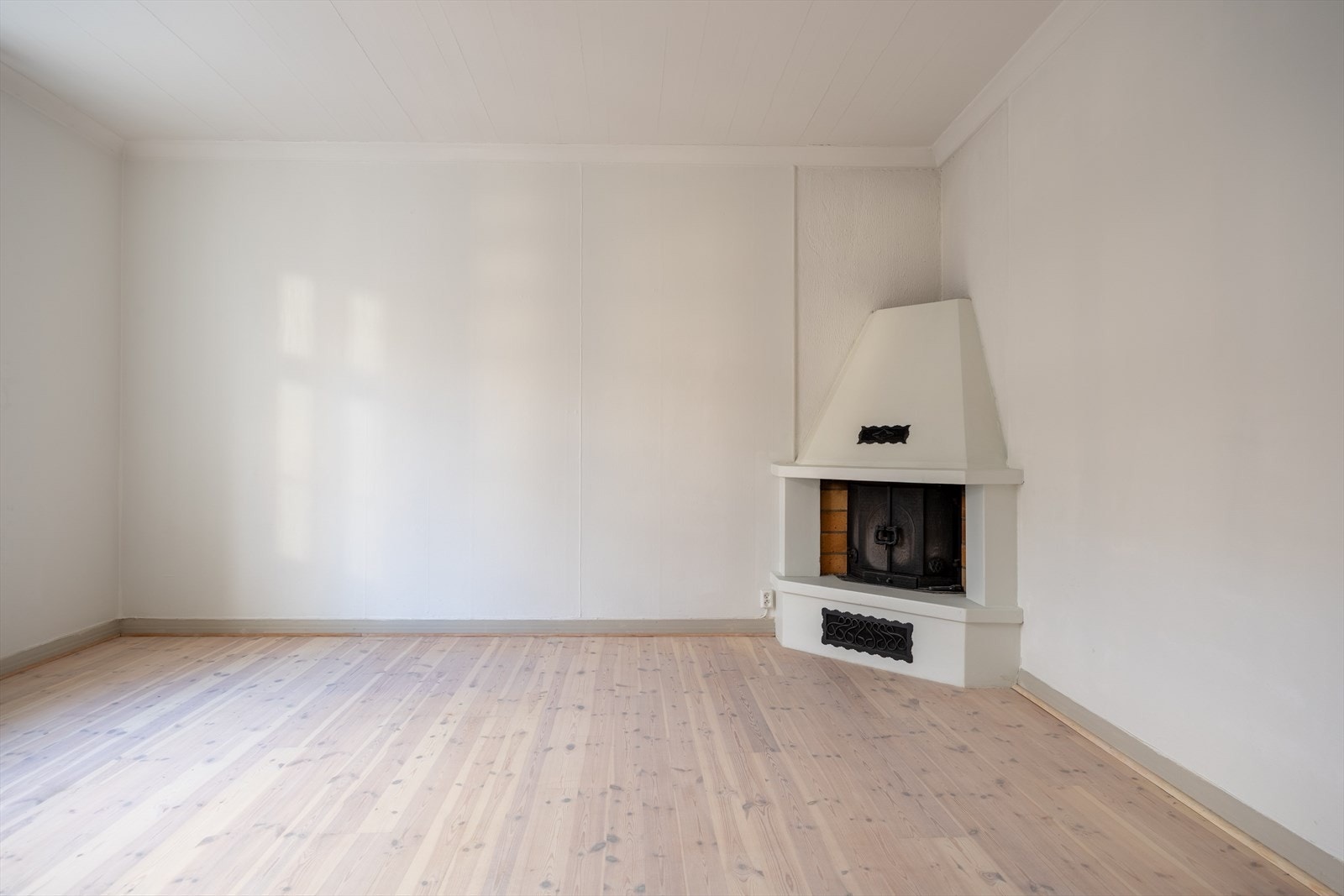 Flott vedovn i stuen Galleribilde