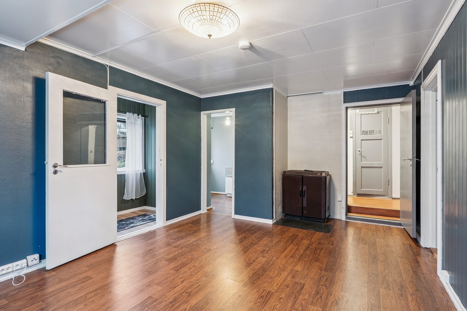 Stue med vedfyring. Galleribilde