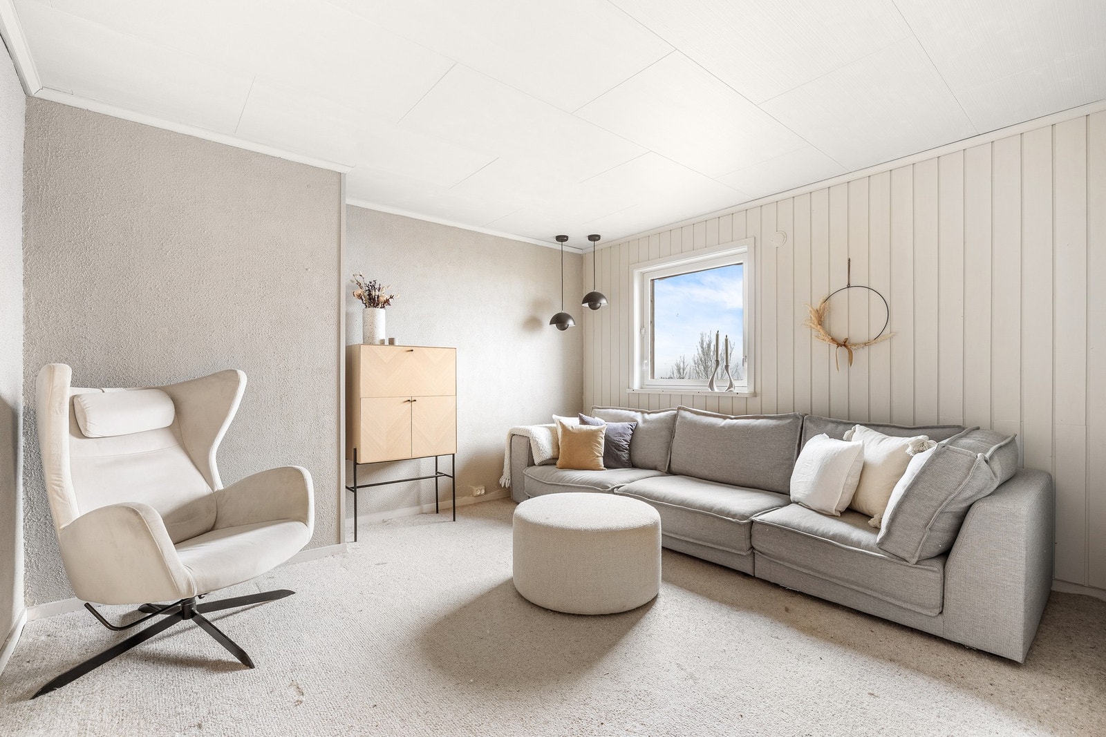 Oppholdsrom i sokkel på 12,5 kvm. Galleribilde