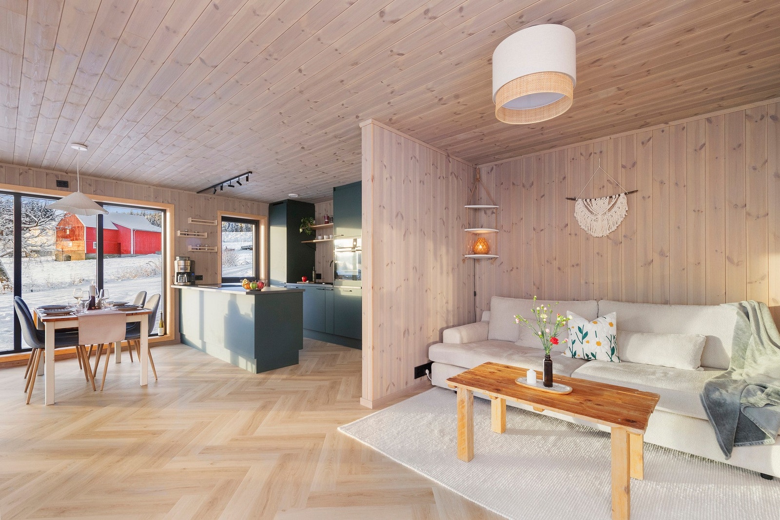 Stue i åpen løsning med kjøkkenet Galleribilde