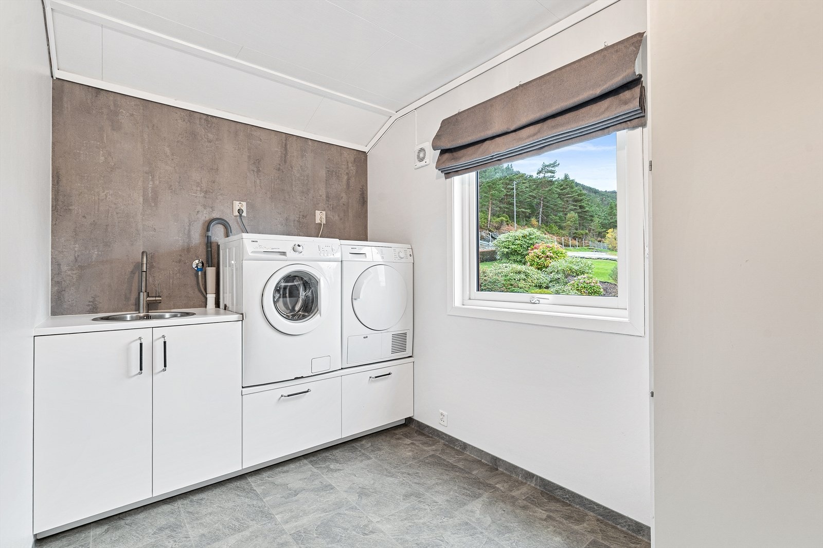 Tidligere soverom er innredet og tatt i bruk som vaskerom Galleribilde