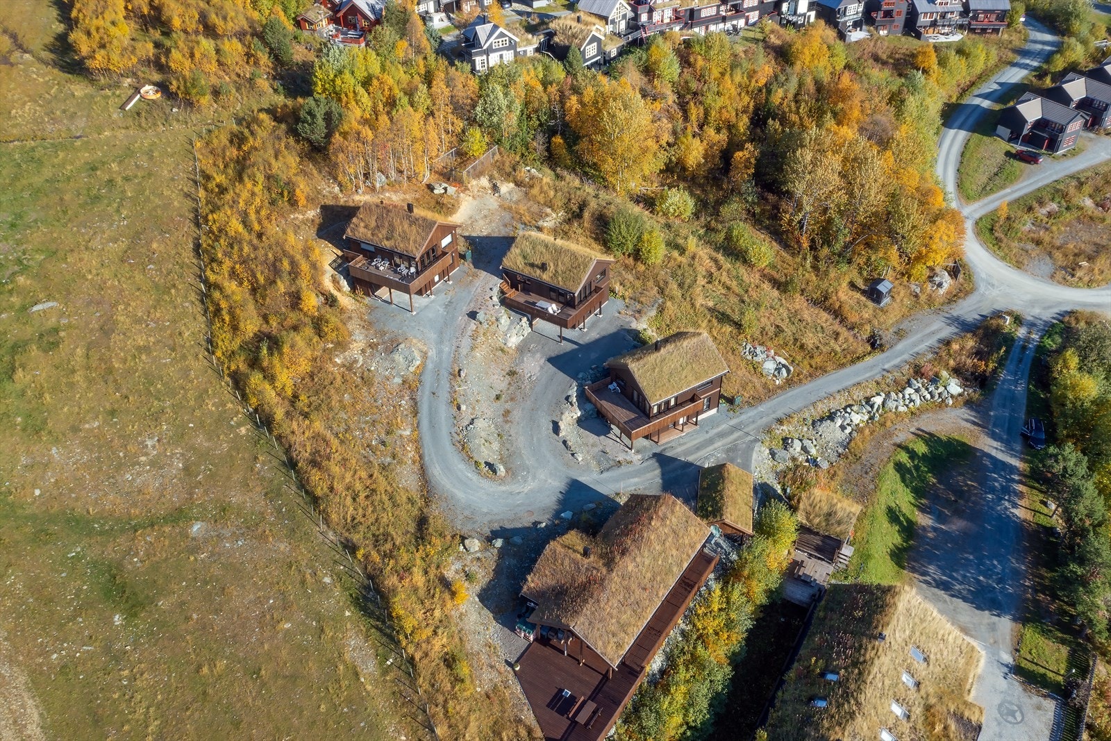 Feltet består av tretten tomter hvorav fire er bebygd Galleribilde