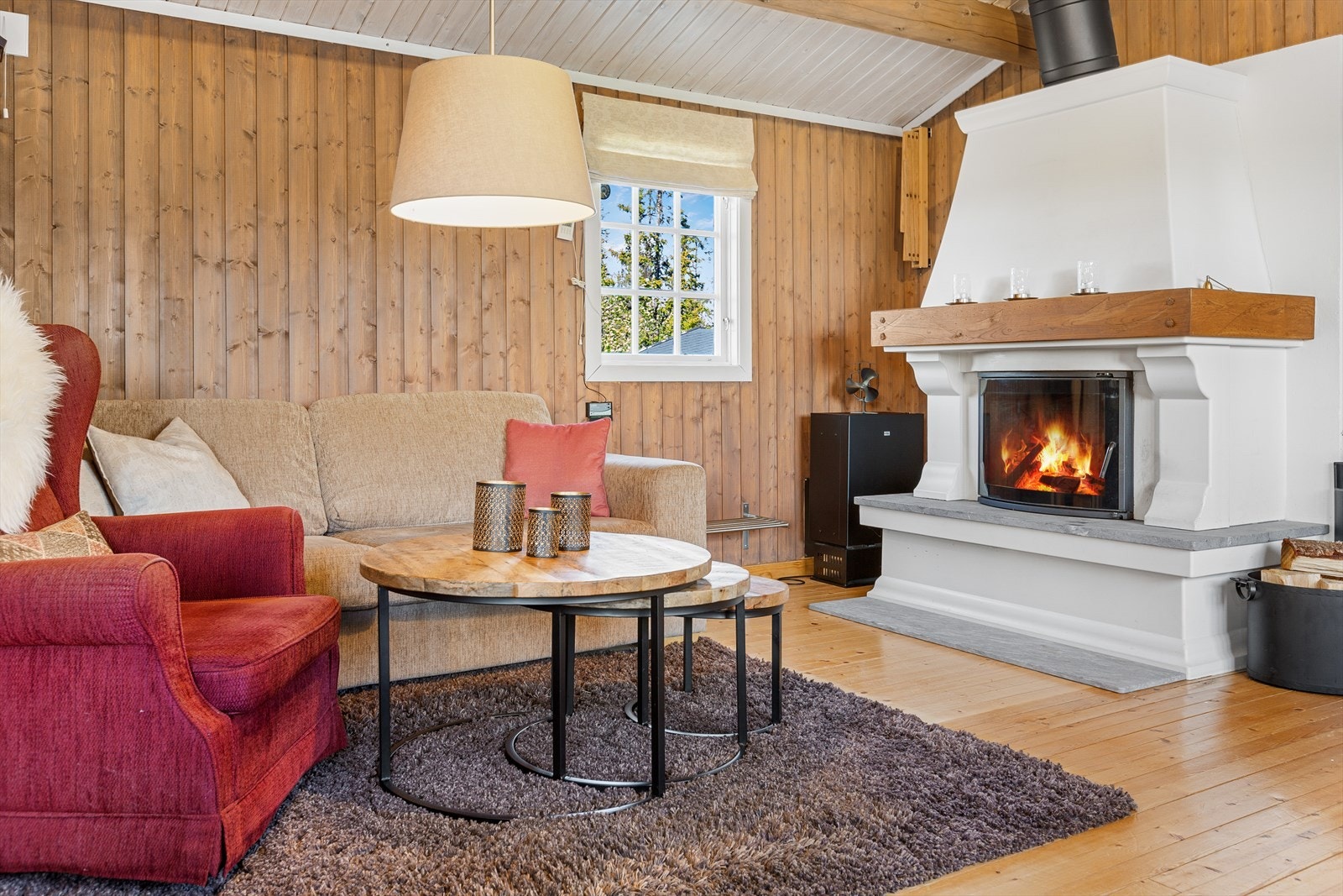 En vakker peis med innsats sørger for den gode hyttestemningen! Galleribilde