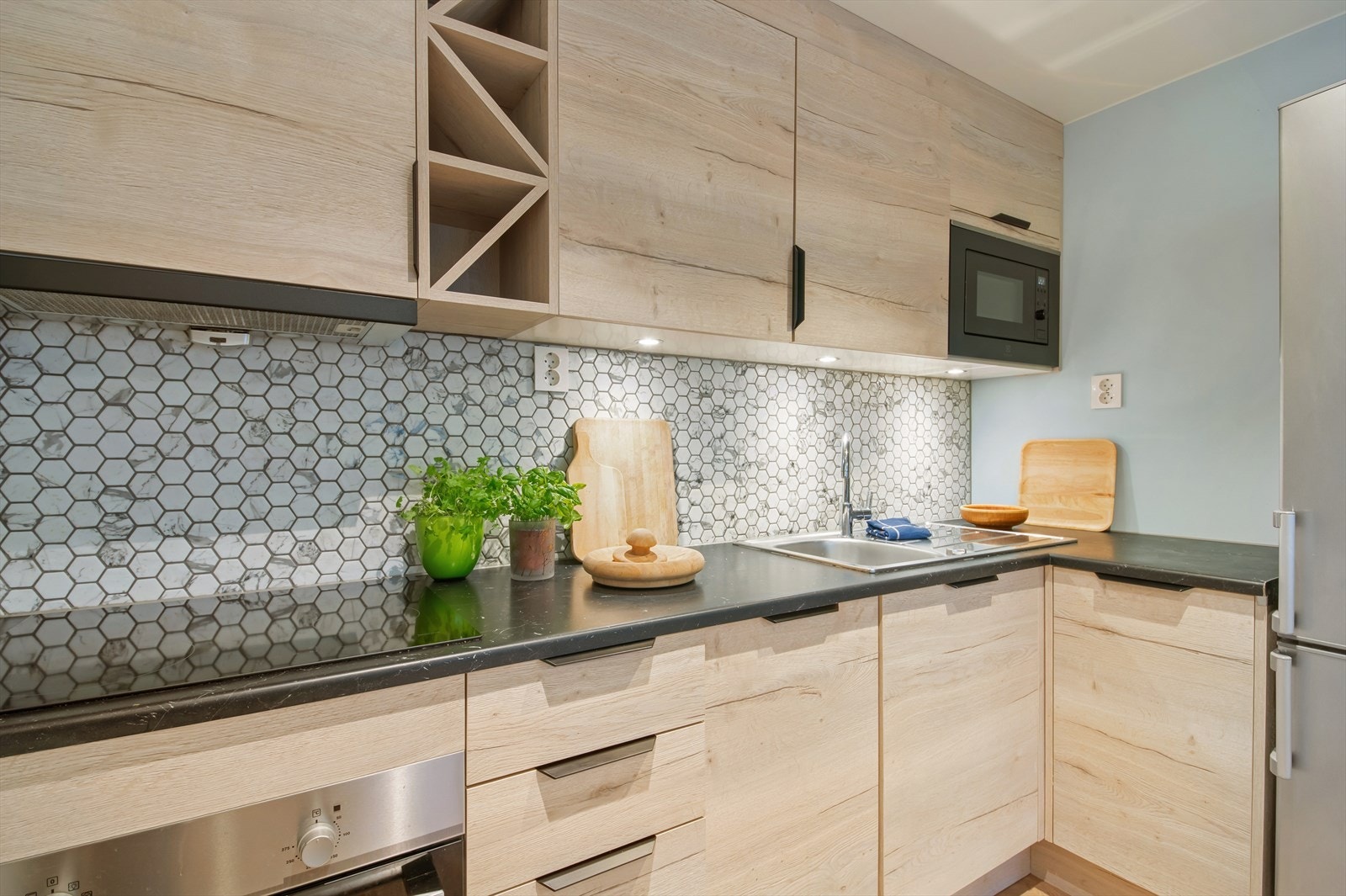 Automatisk vannstopper og komfyrvakt er montert. Galleribilde