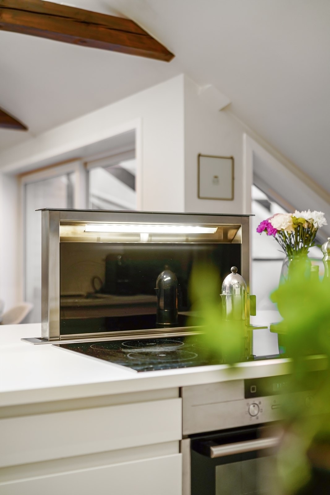 Integrert kullfiltervifte i platetoppen. Galleribilde