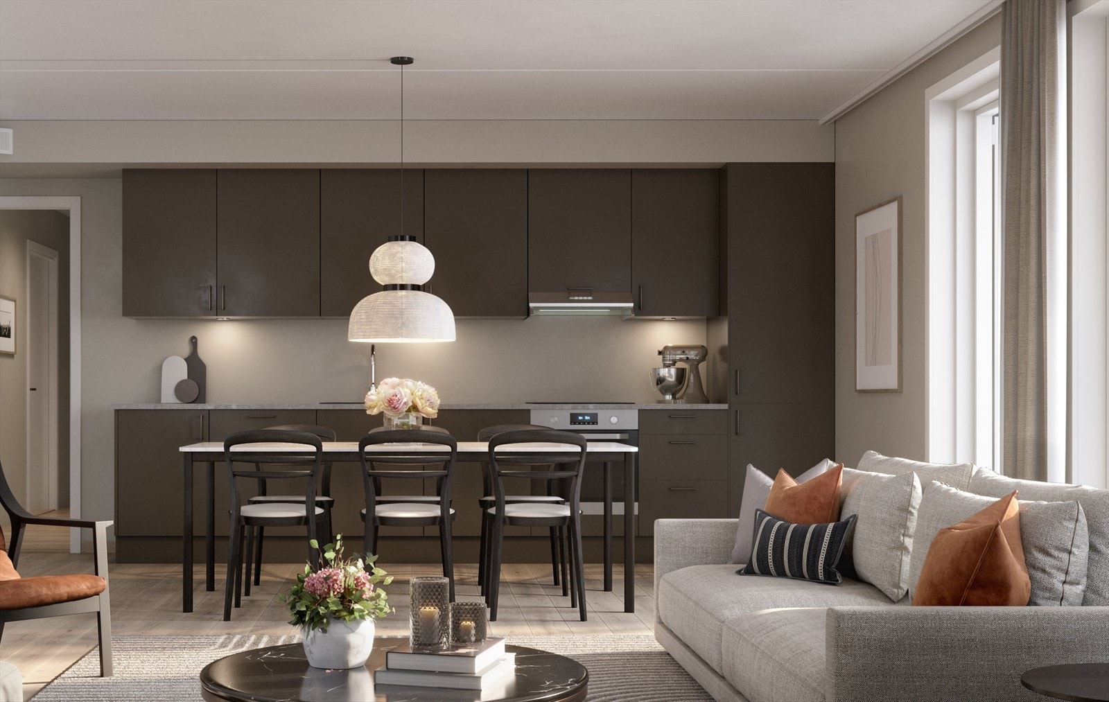 Kjøkken med grå fronter. Integrerte hvitevarer, samt avtrekksvifte i rustfritt stål (bildet er fra en annen leilighet) Galleribilde