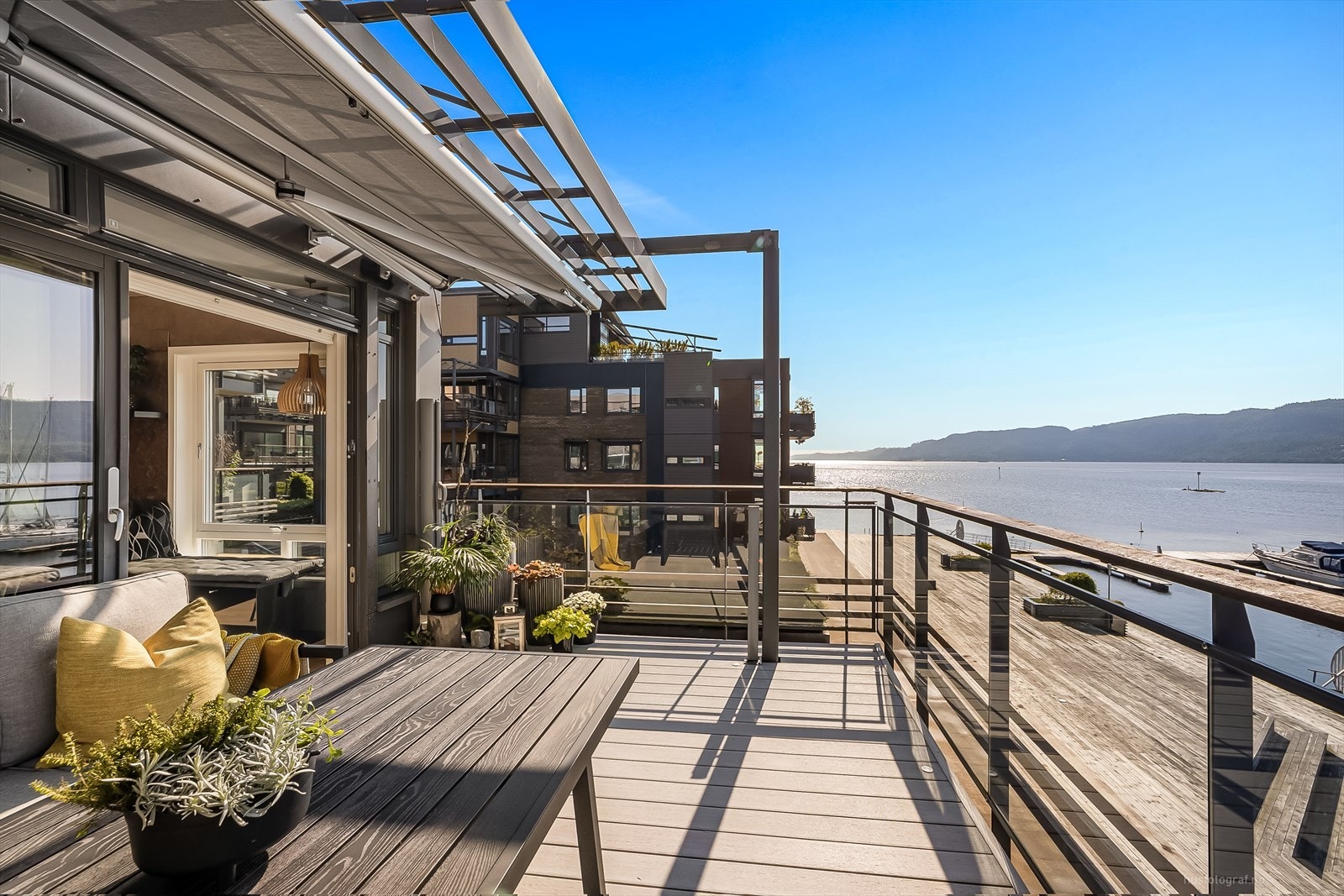 Velkommen til Kaiveien 10- Presentert av Kent Salte / DNB Eiendom- En lekker leilighet, solrik beliggenhet og en utsikt som bare må oppleves! Galleribilde