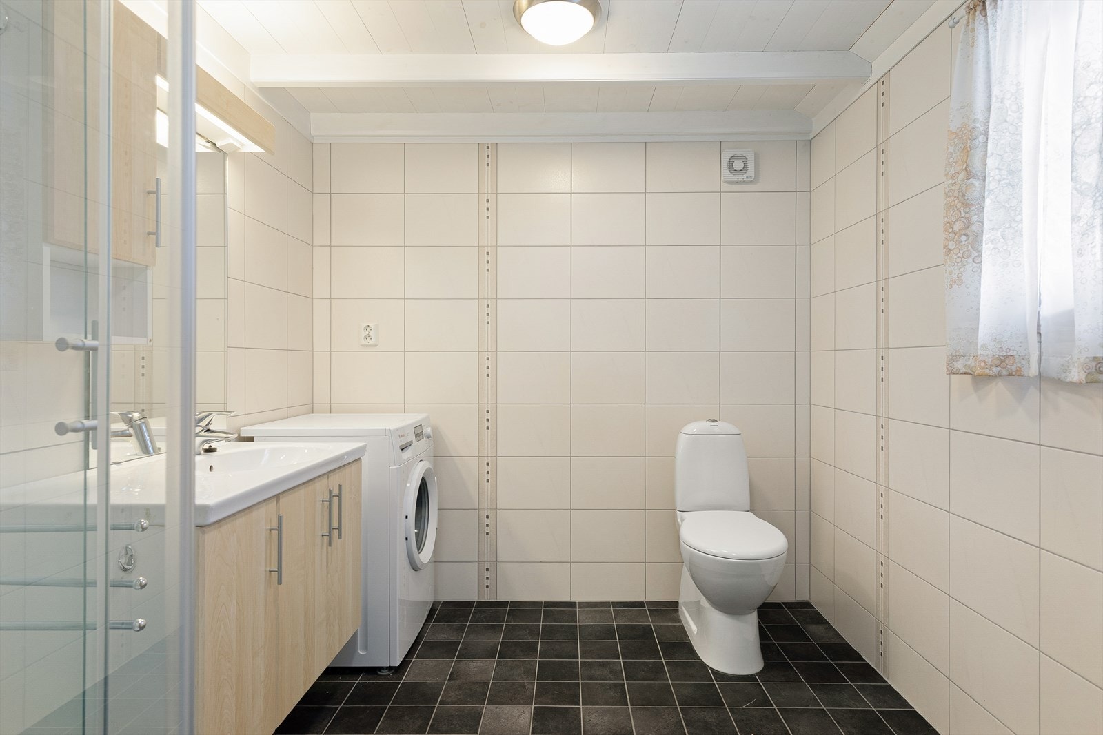 Badet har også opplegg for vaskemaskin. Galleribilde