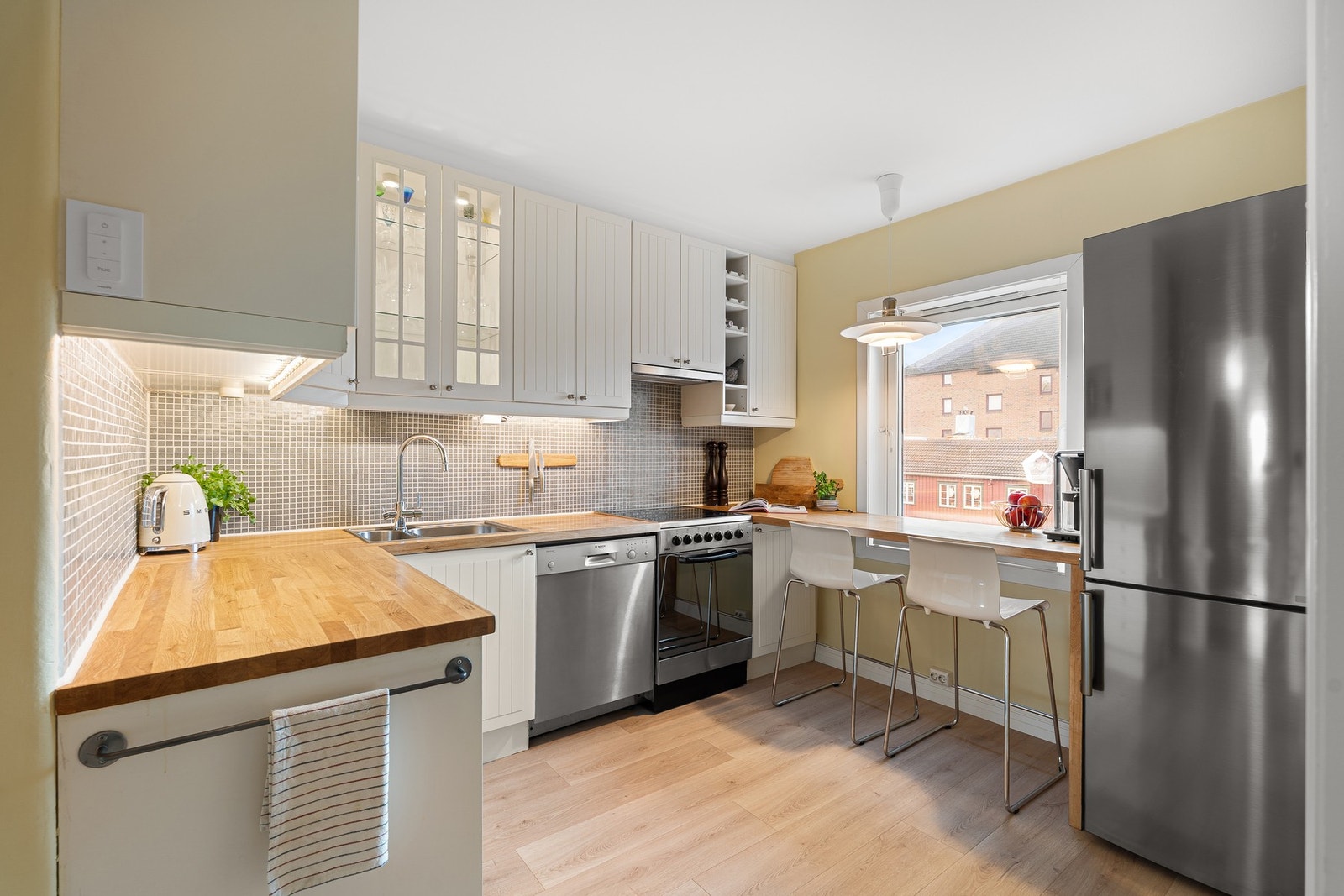 Fint kjøkken fra 2008 med tilstandsgrad 1 i tilstandsrapport fra takstmann. Galleribilde