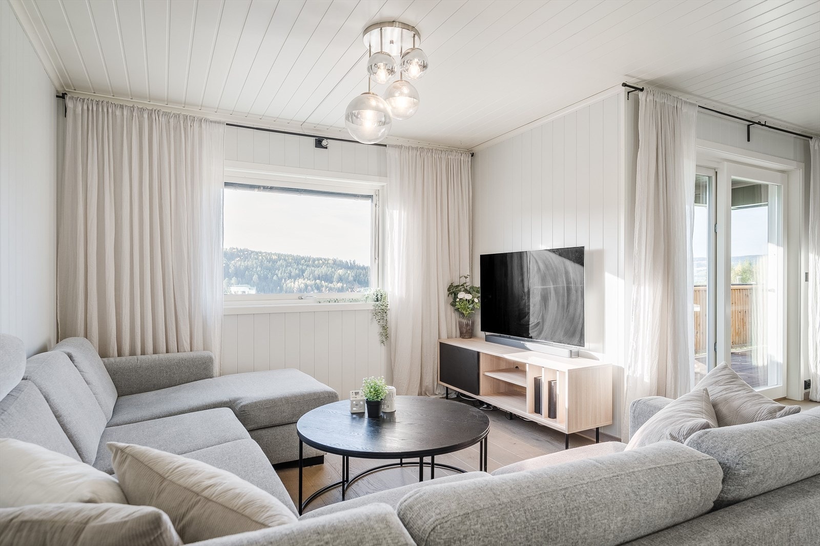 Stuen er et lyst og hyggelig rom. Galleribilde