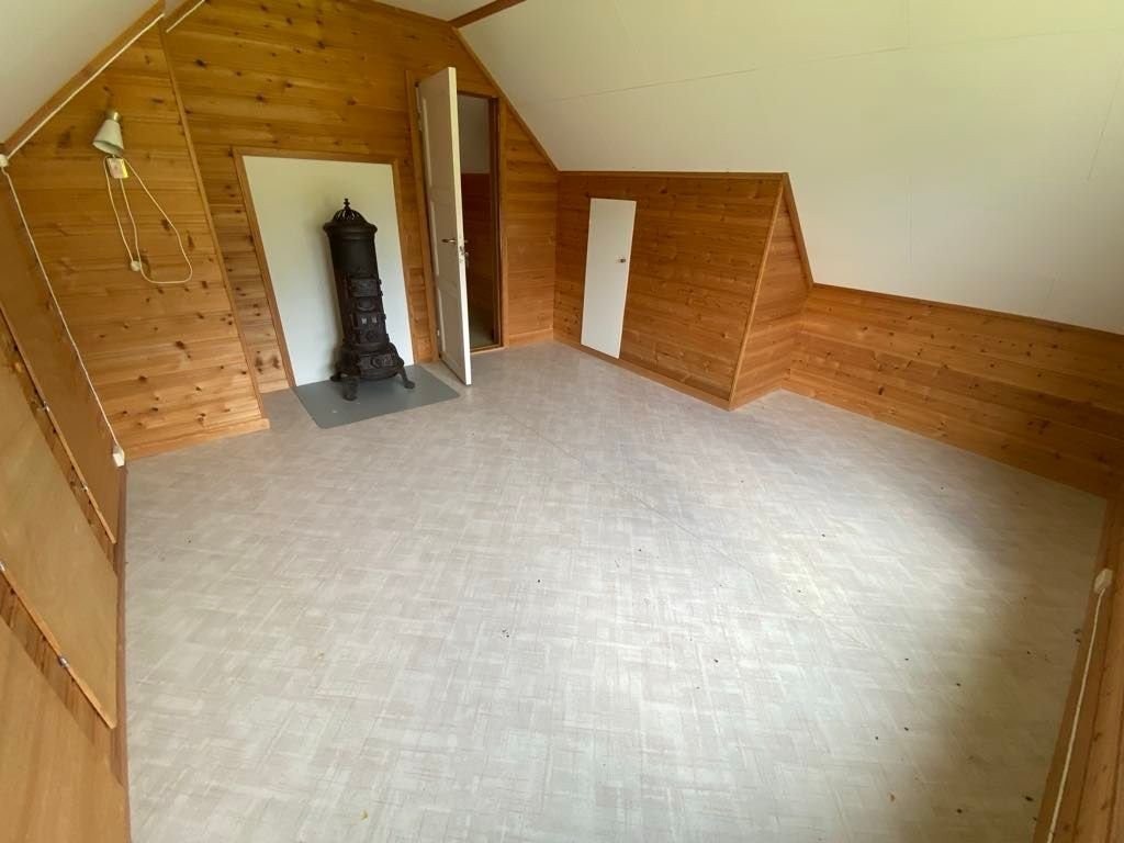 Soverom med mulighet for vedfyring. Galleribilde