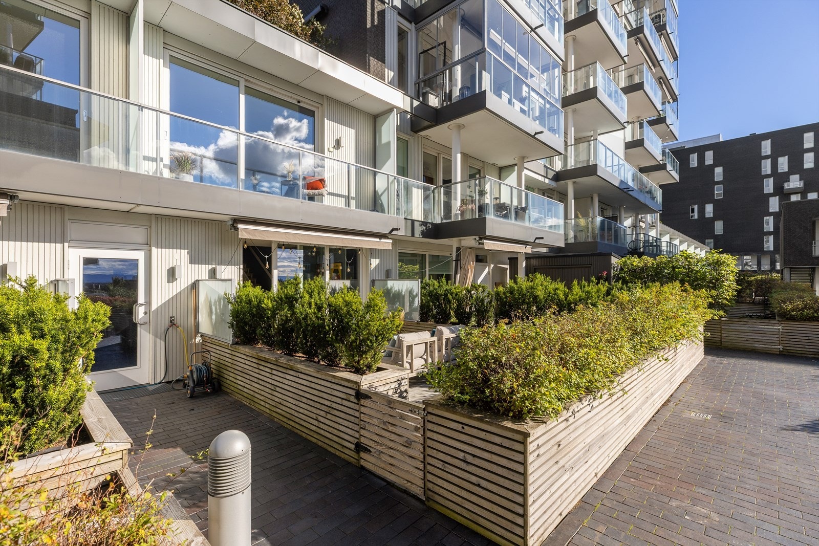 Sameiet er kjent for høy trivselsfaktor og sitt gode bomiljø Galleribilde