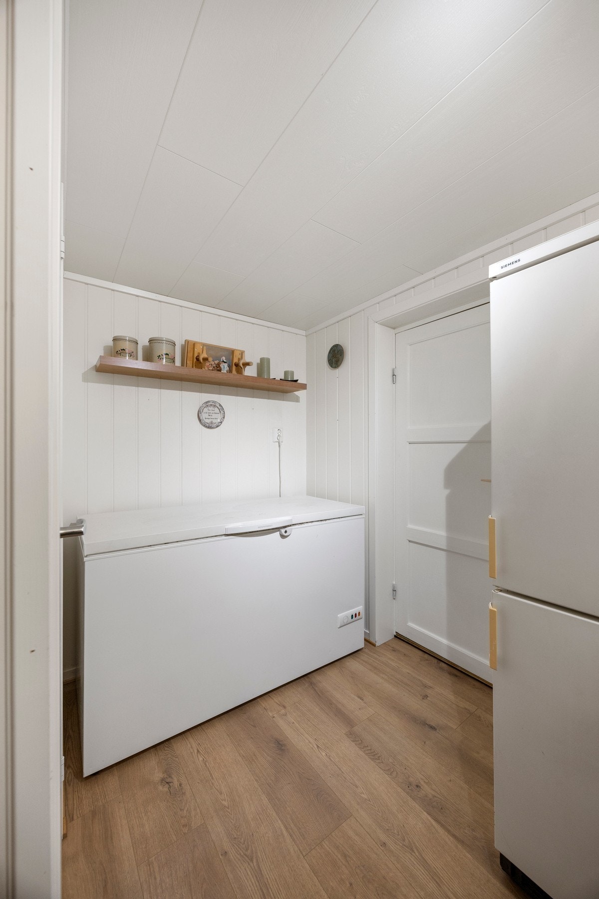 Gang i sokkel med adkomst til vaskerom, WC og bod. Galleribilde