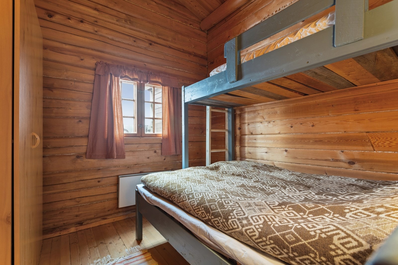 Fritidsboligen inneholder to soverom Galleribilde